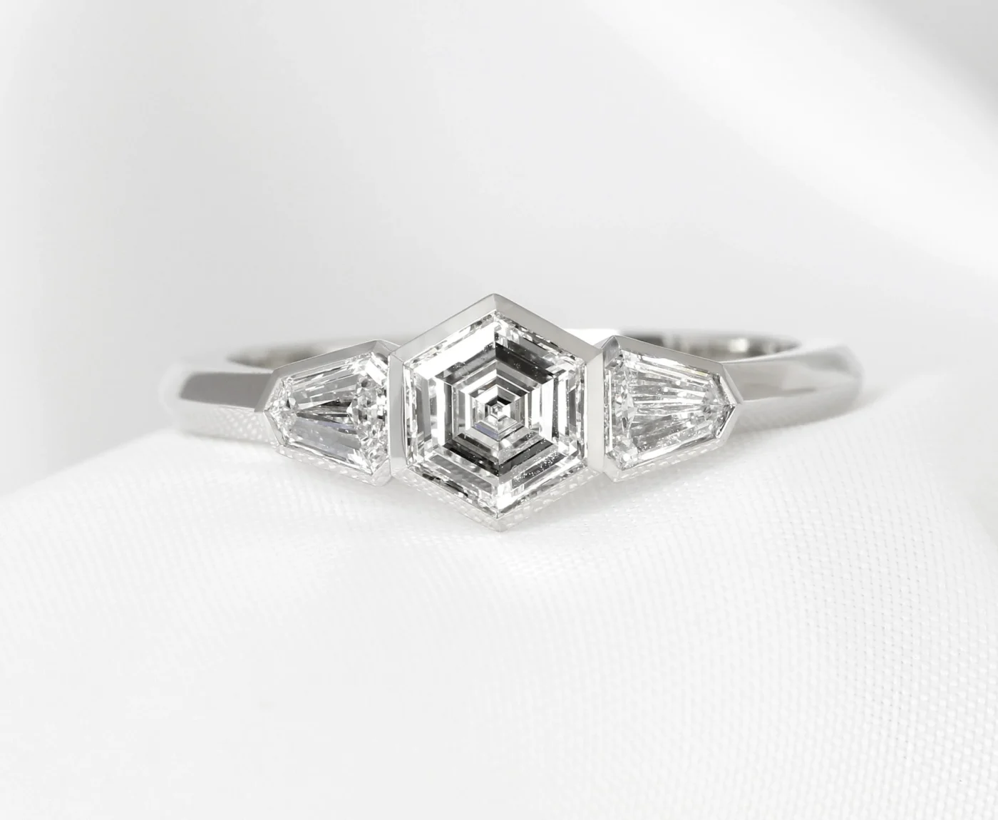 Diamond Ring in Platinum: Centre Hexagonal Diamond with Two Shield Cut Diamonds Completed for Stock and Sold in 2023
