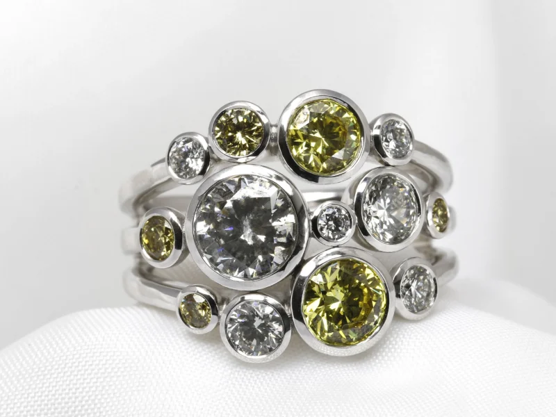 Bespoke Commission Completed 2025: Timothy Roe Raindance Ring with Natural White Diamonds and Laboratory-Grown Yellow Diamonds in Platinum. 