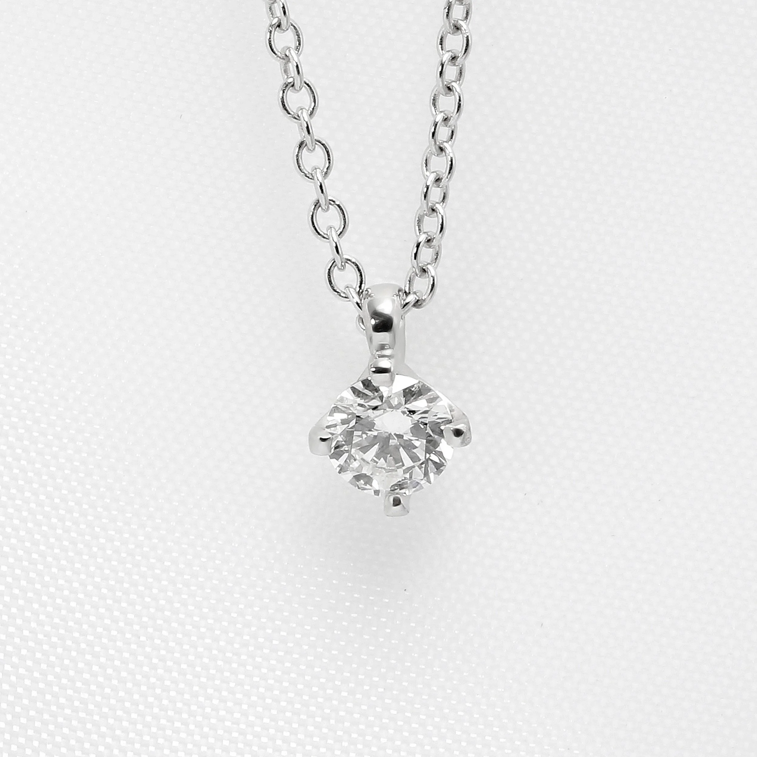 Claw Set Diamond Solitaire Pendant in White Gold