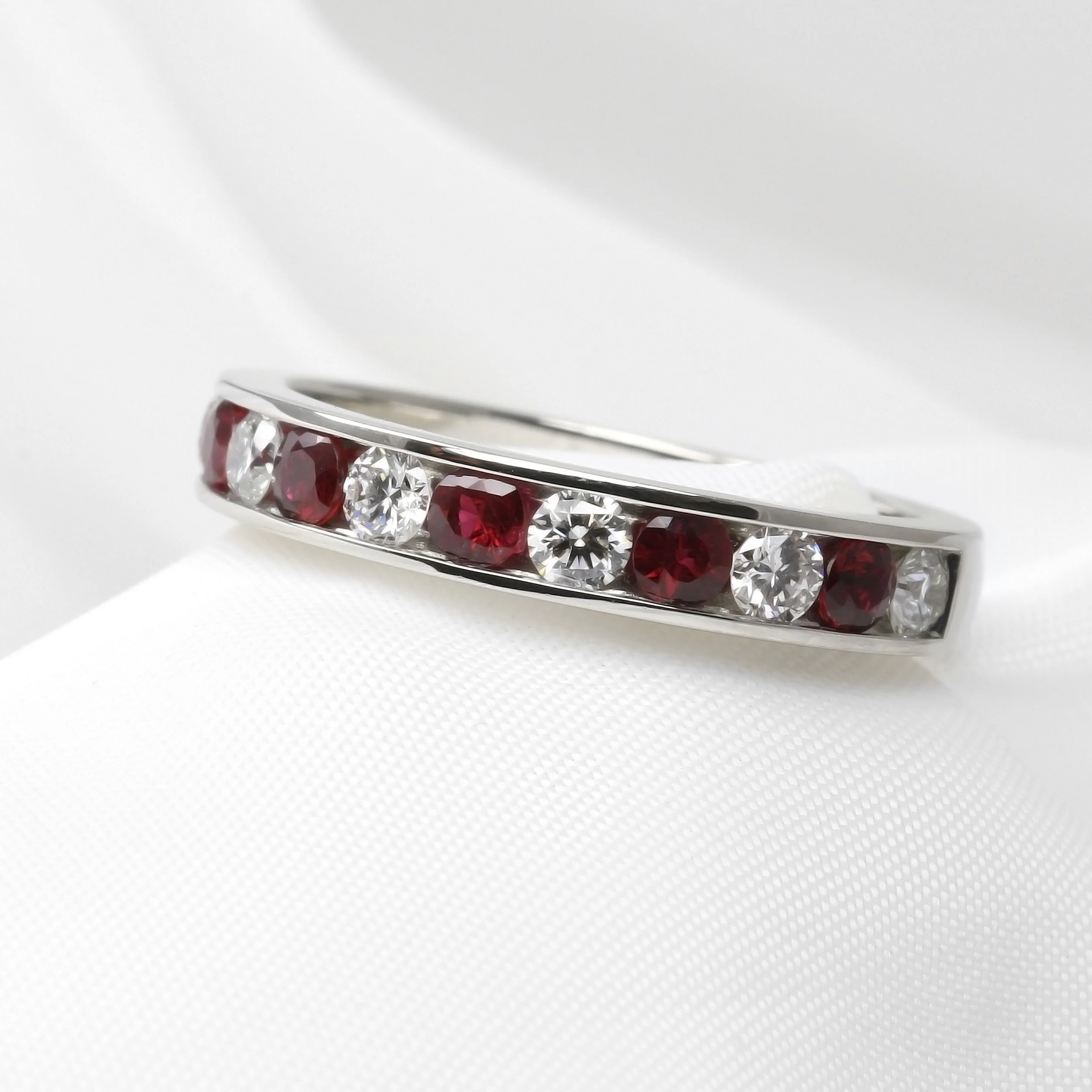 Ruby and Diamond Channel Set Eternity Ring in Platinum