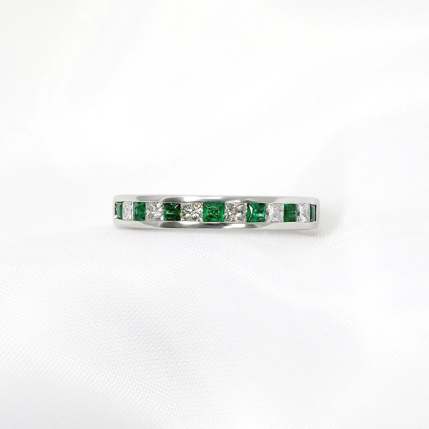 Emerald & Diamond Half Eternity Ring in White Gold