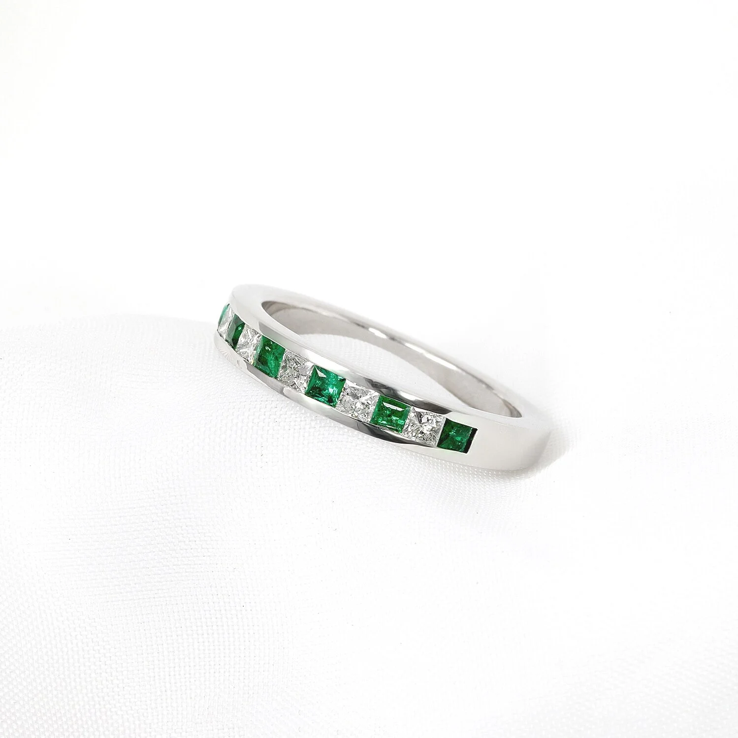 Emerald & Diamond Half Eternity Ring in White Gold