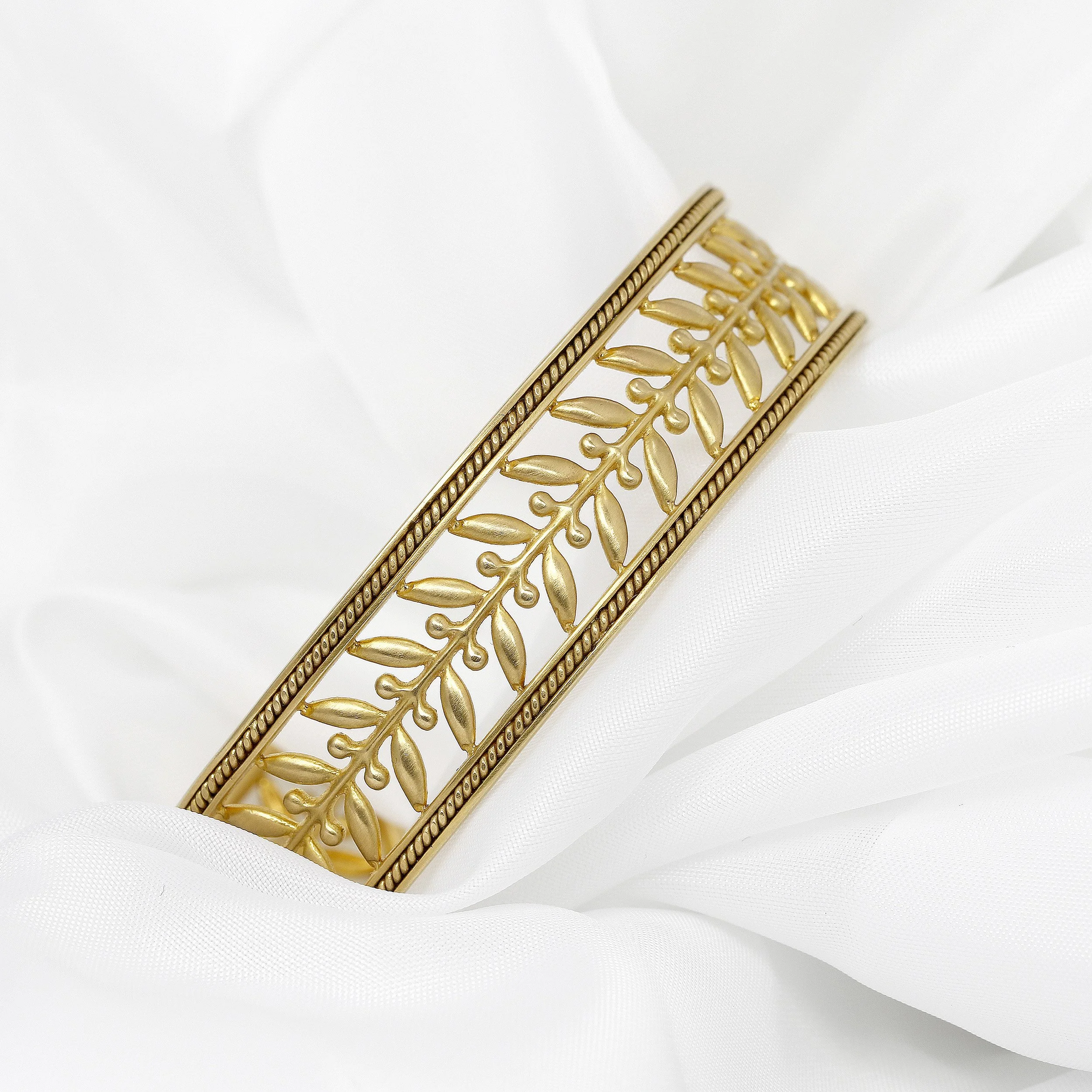 Laurel Leaf Torque Bangle in Yellow Gold