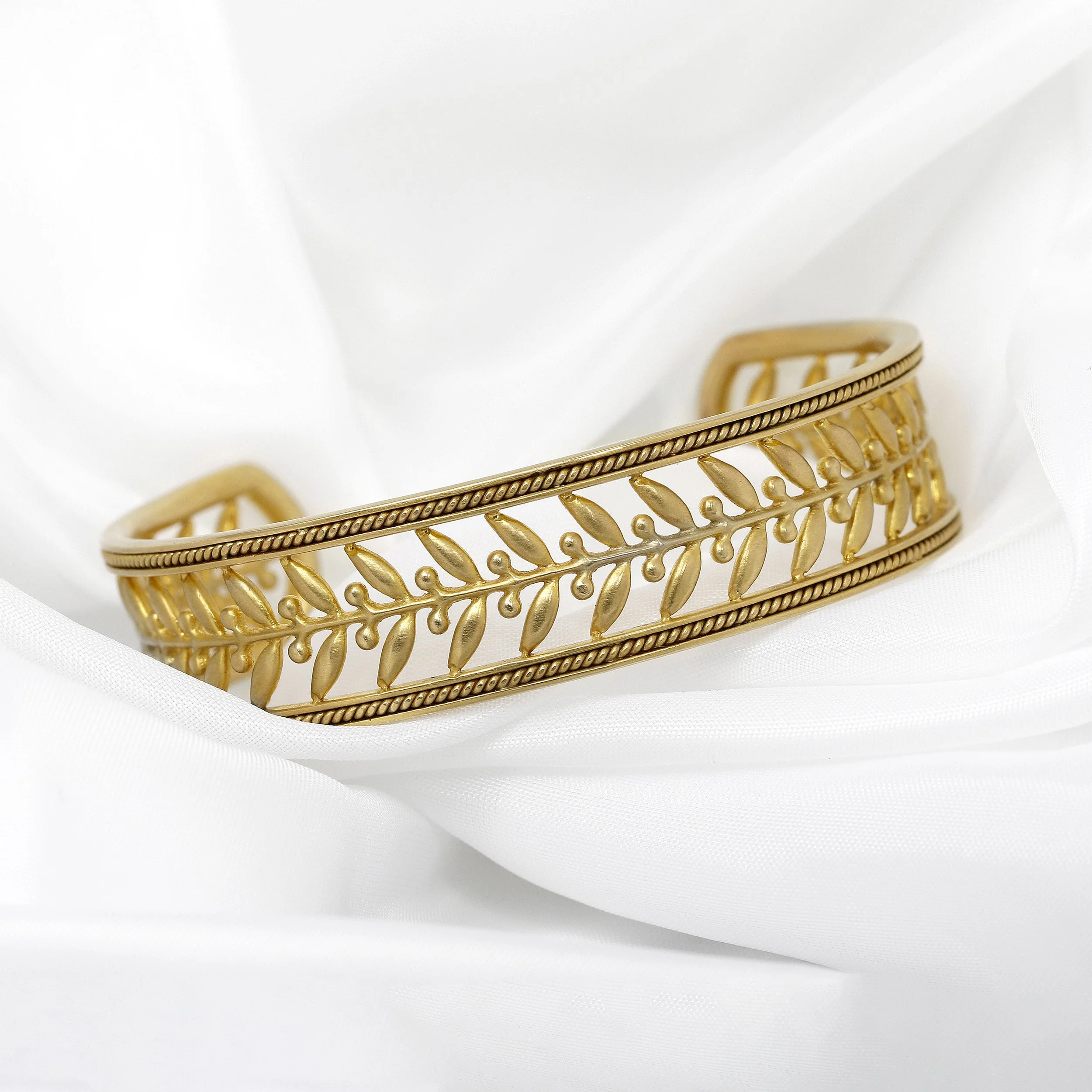 Laurel Leaf Torque Bangle in Yellow Gold