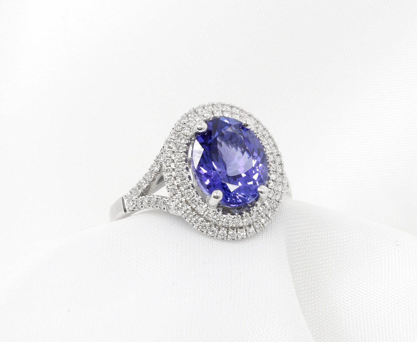 Tanzanite and Diamond Double Halo Ring in 18ct White Gold
