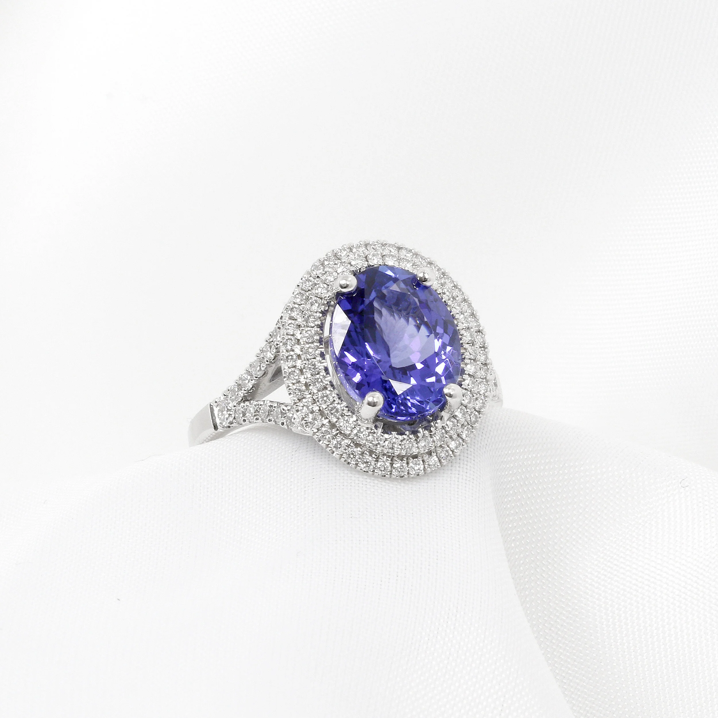 Tanzanite and Diamond Double Halo Ring in 18ct White Gold