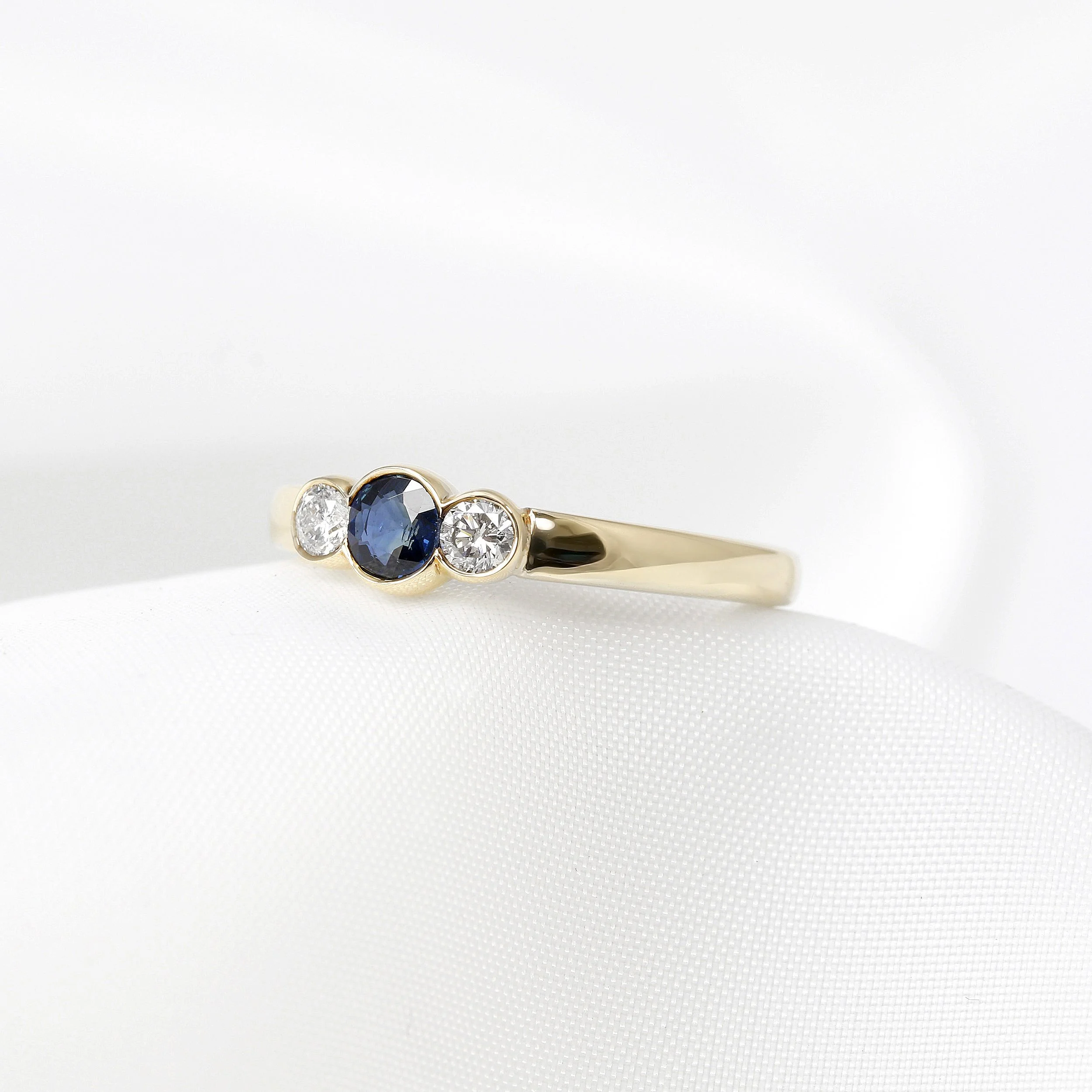 Blue Sapphire & Diamond Rub Over Set Three Stone Ring
