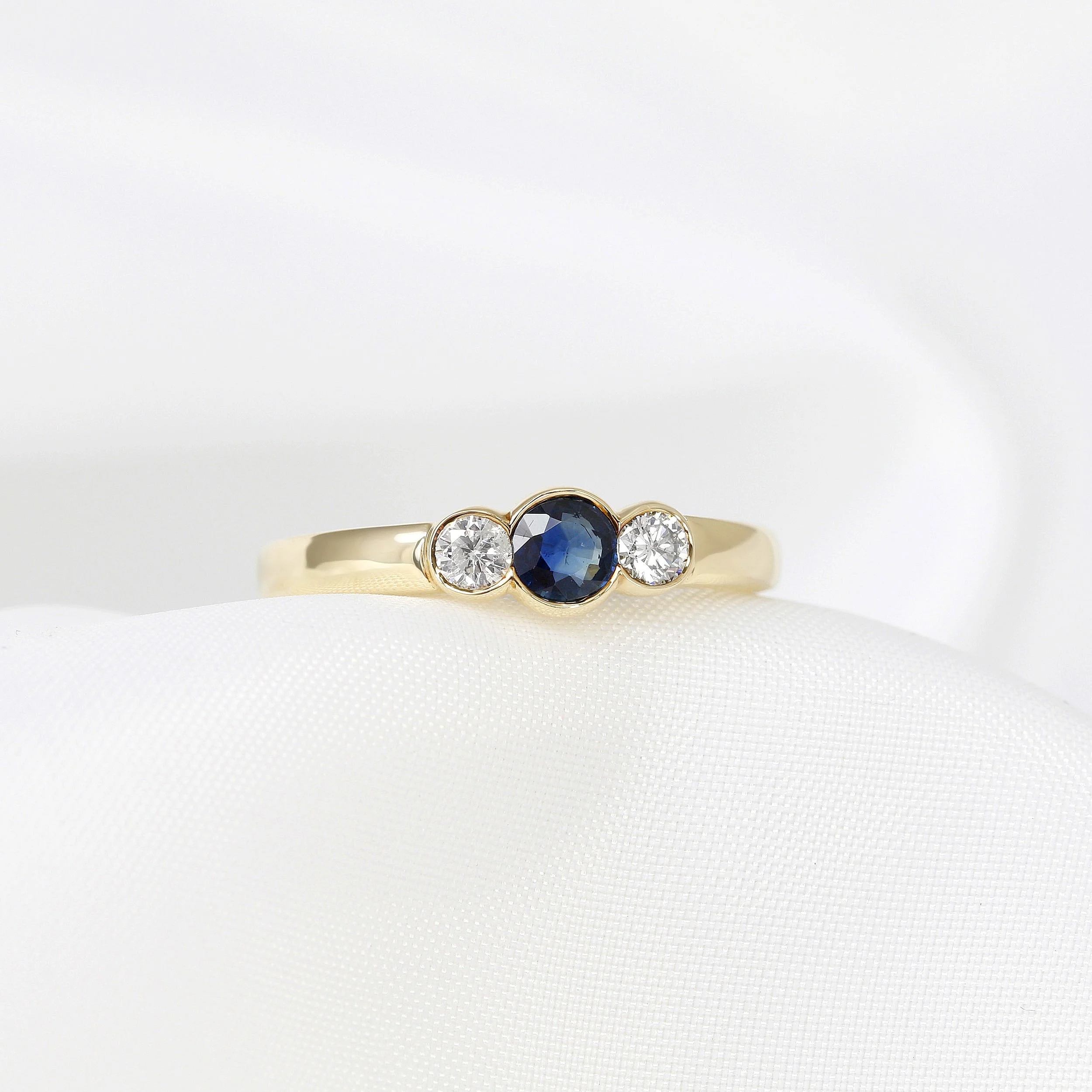 Blue Sapphire & Diamond Rub Over Set Three Stone Ring