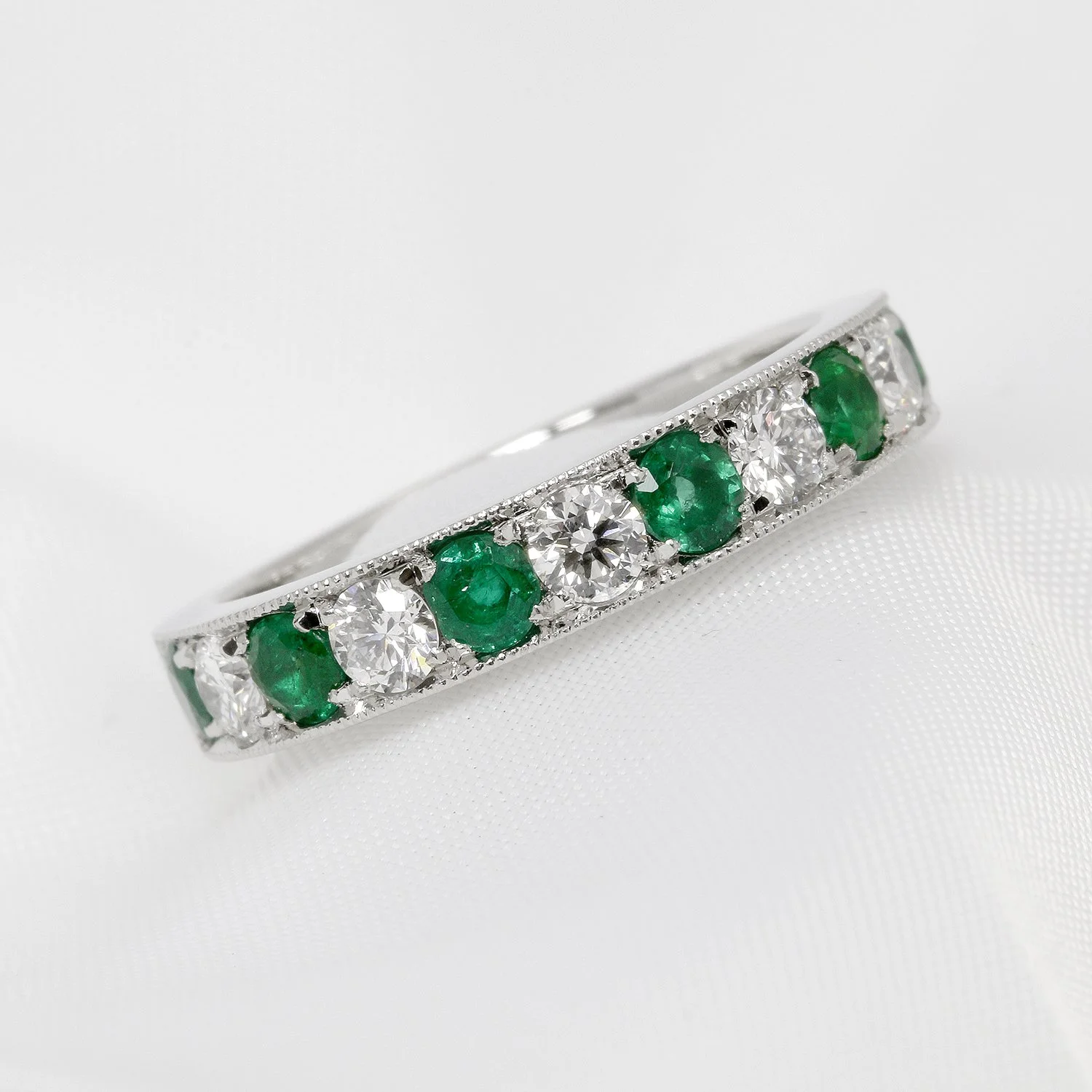 Emerald & Diamond Half Eternity Ring in Platinum