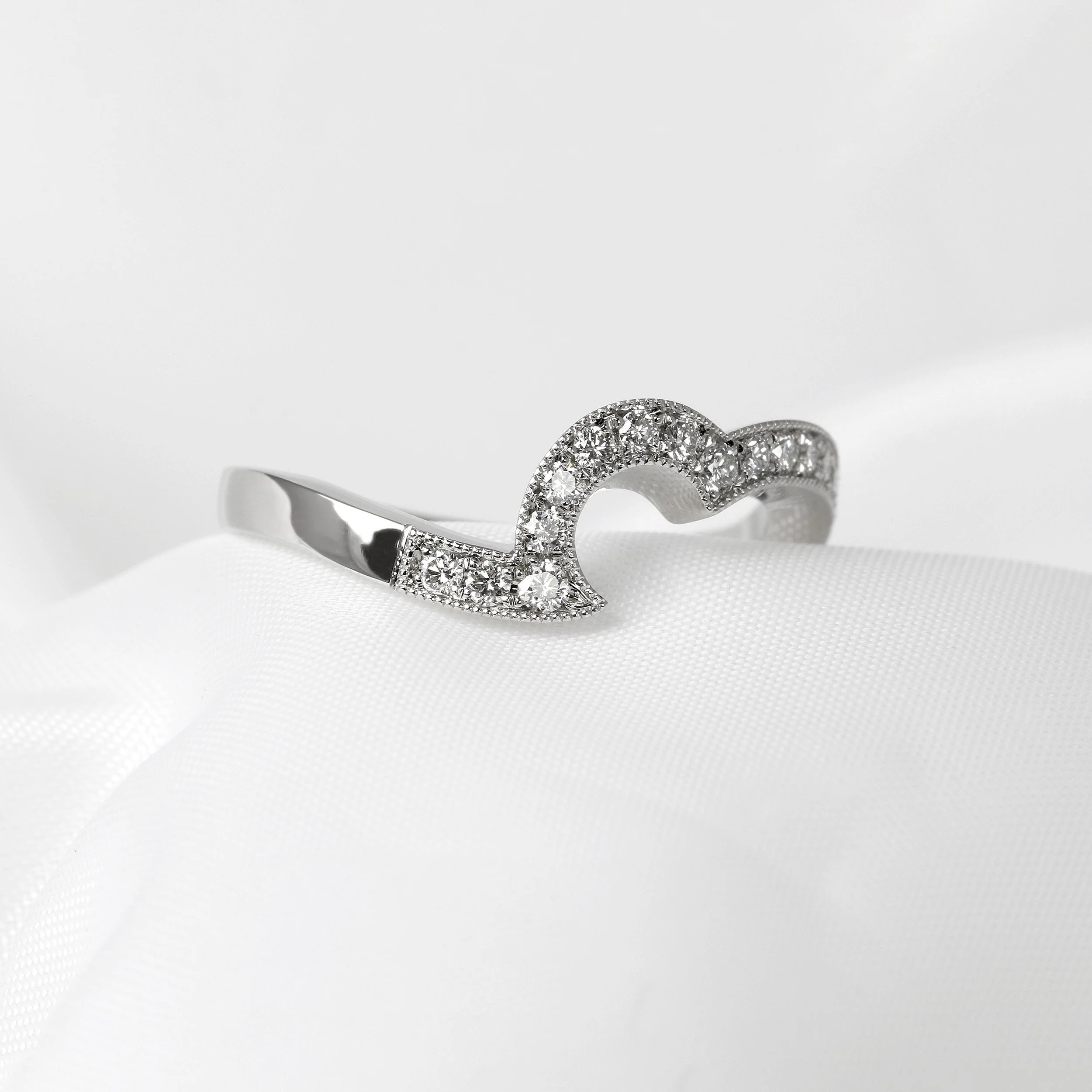 Shaped Grain Set Diamond Wedding Ring in Platinum