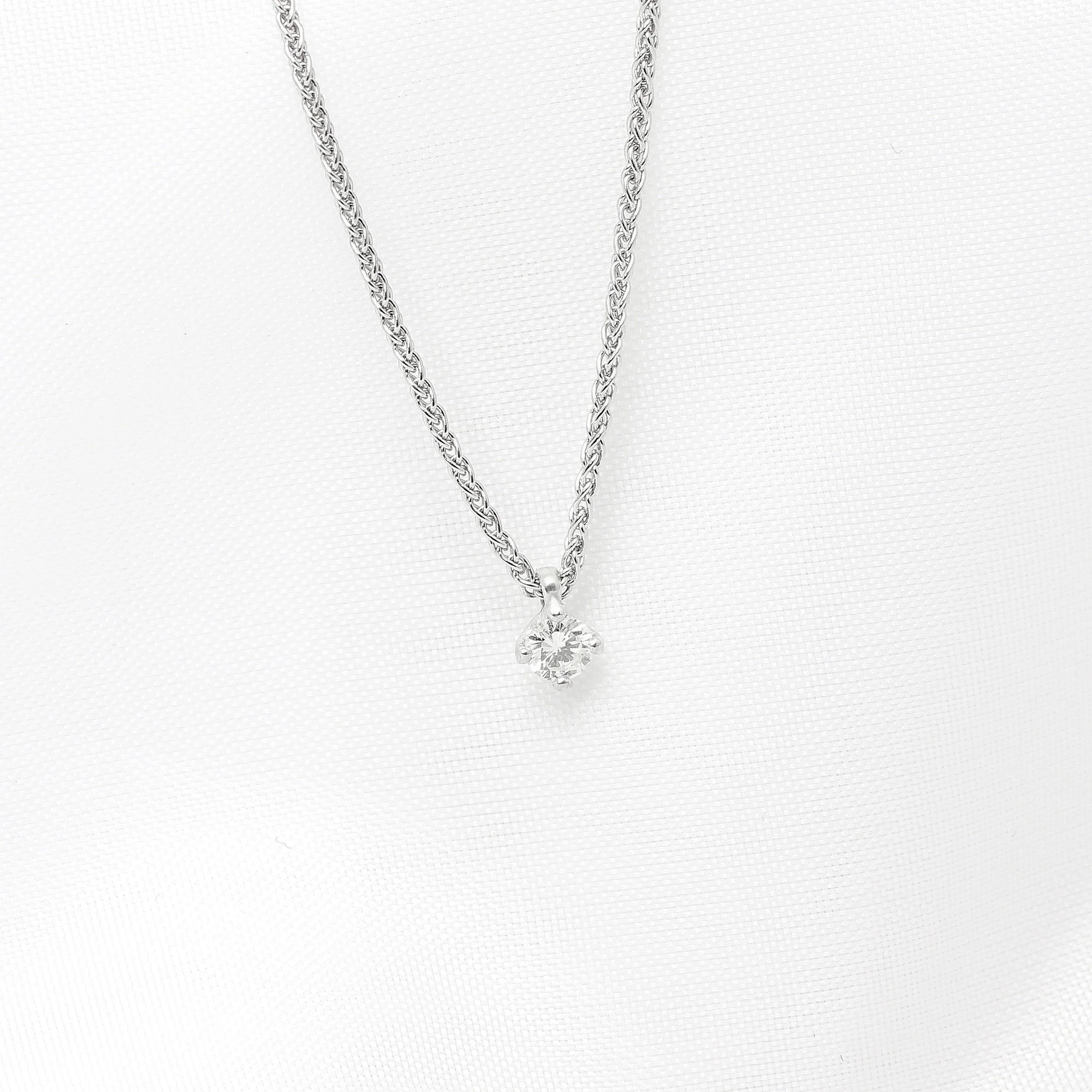 Claw Set Diamond Solitaire Pendant in White Gold