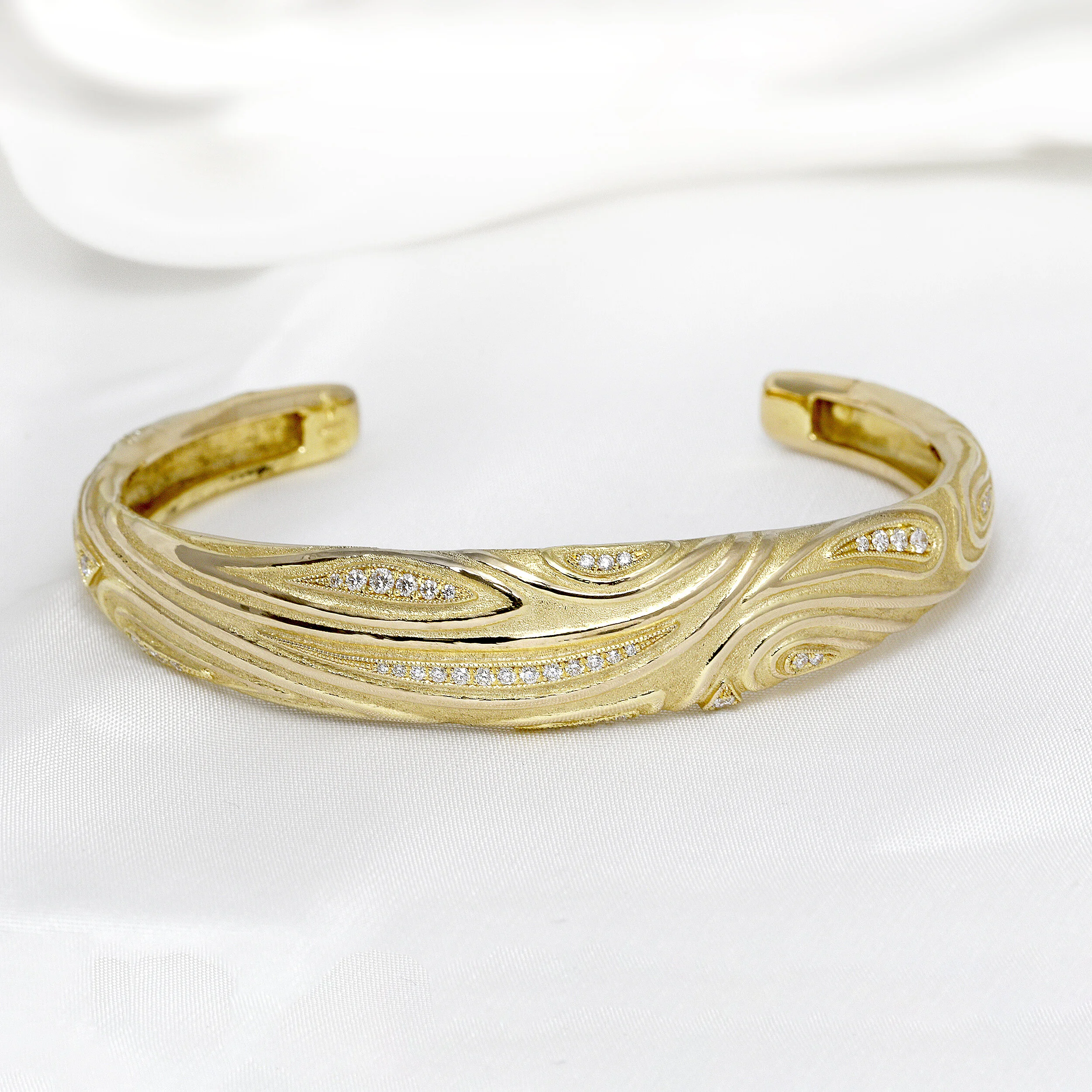 Diamond Torque Bangle in Yellow Gold