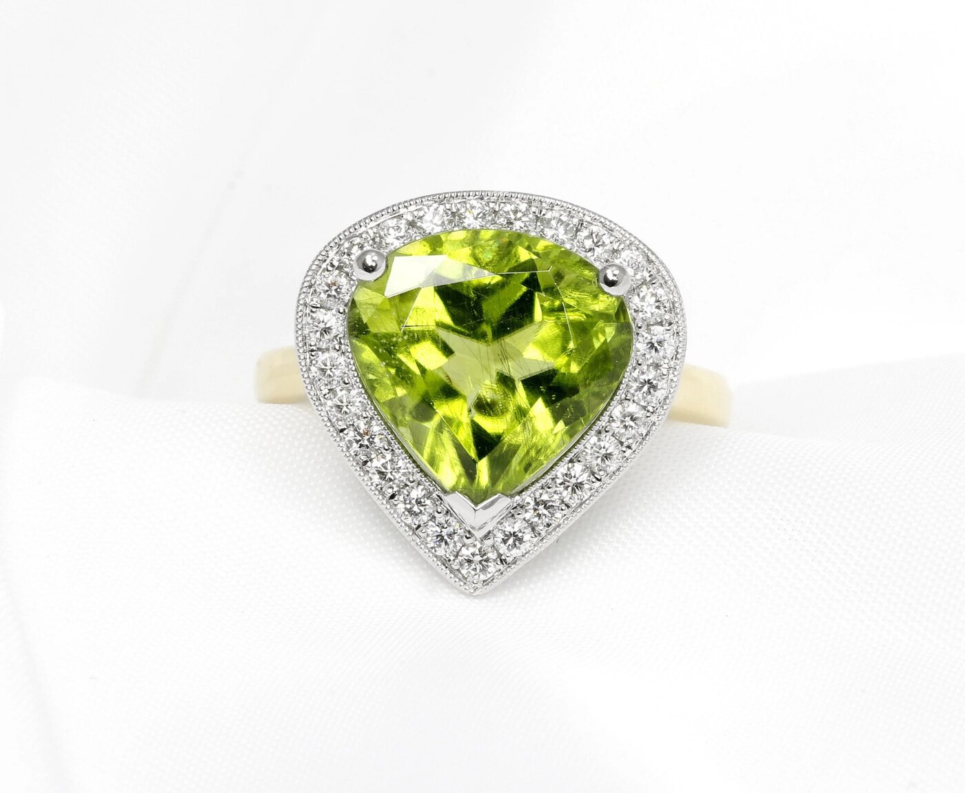 Peridot & Diamond Halo Ring in Platinum & Yellow Gold