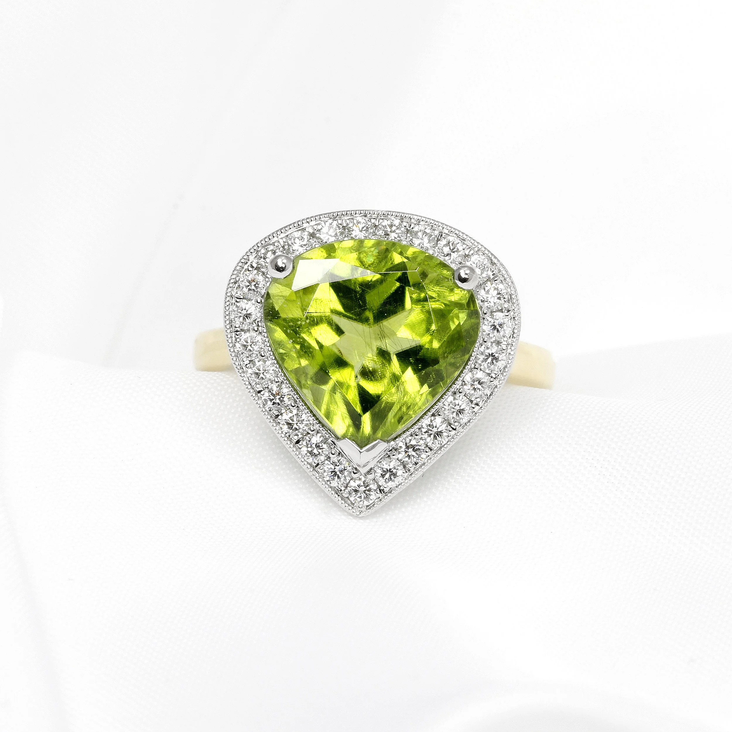 Peridot & Diamond Halo Ring in Platinum & Yellow Gold