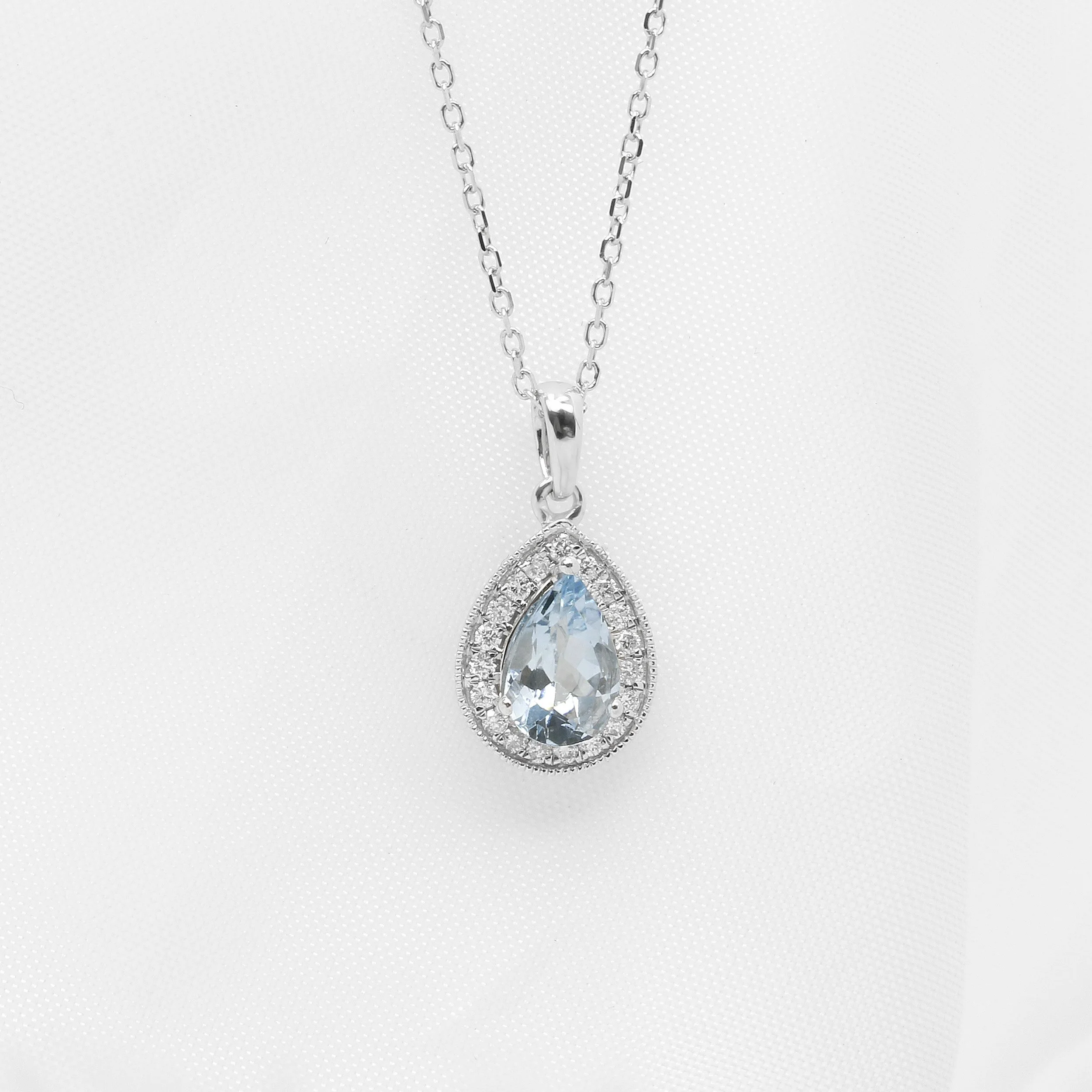 Aquamarine and Diamond Pear Shaped Halo Pendant