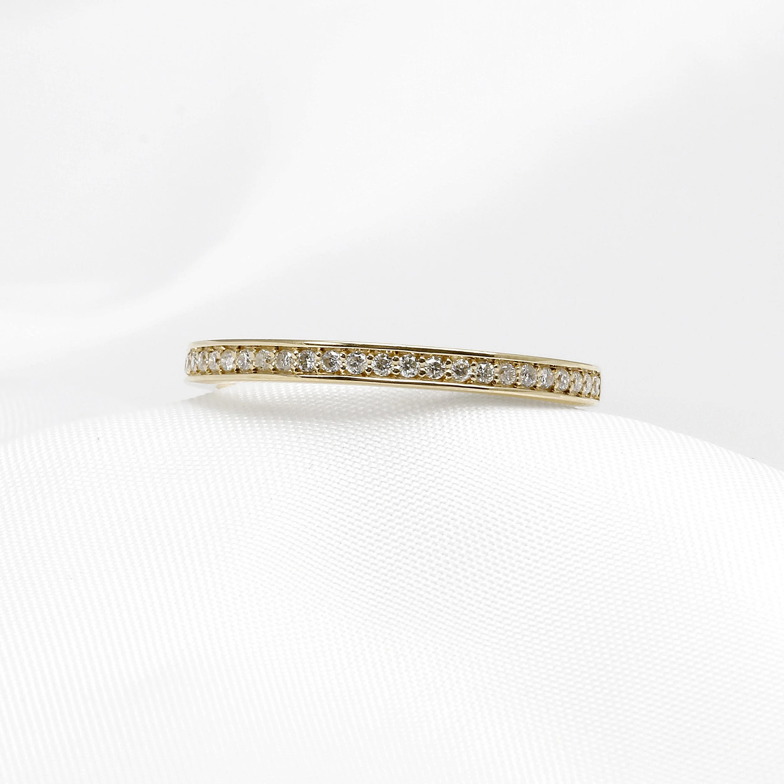 Grain Set Diamond Eternity Ring in Yellow Gold