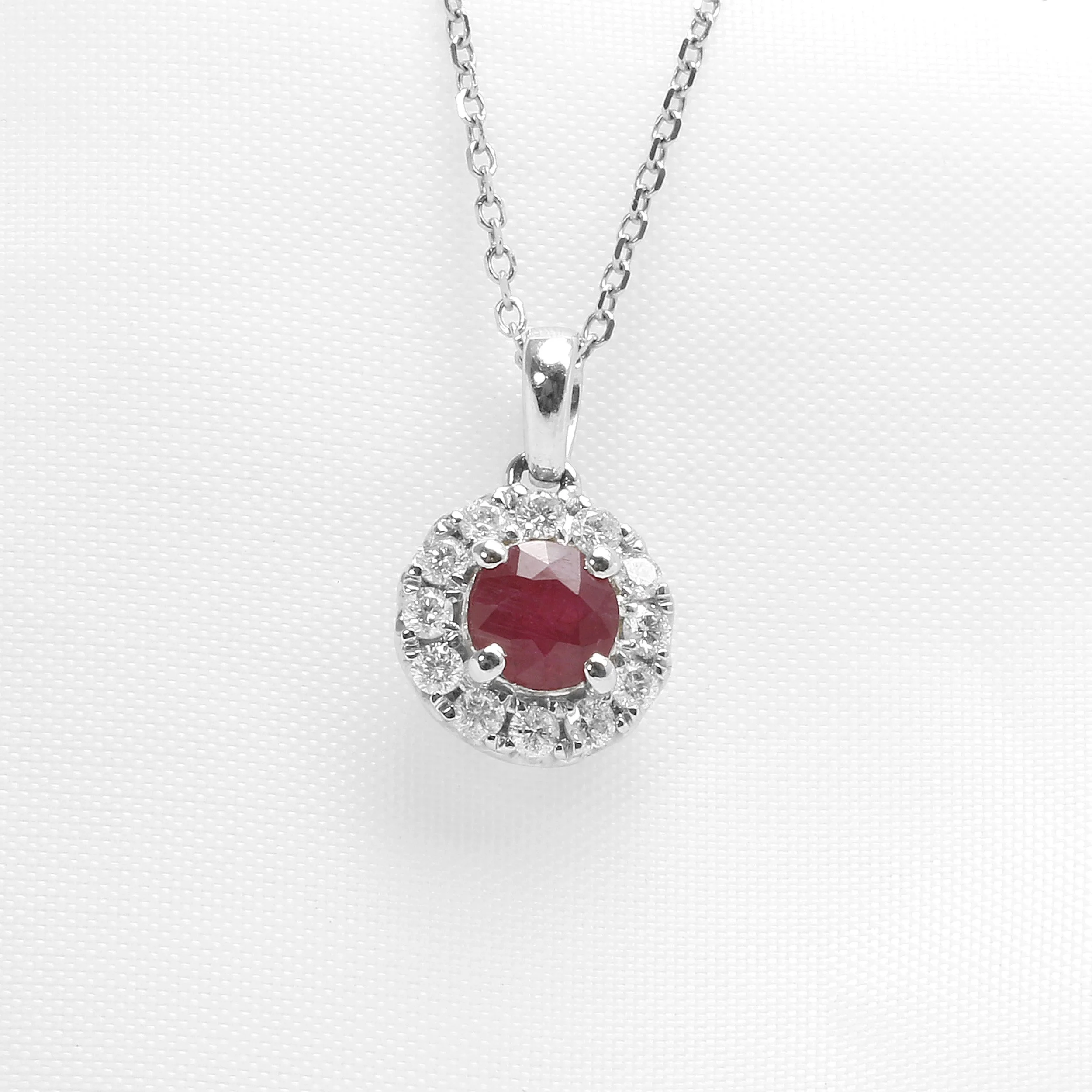 Ruby and Diamond Halo Pendant in 18ct White Gold