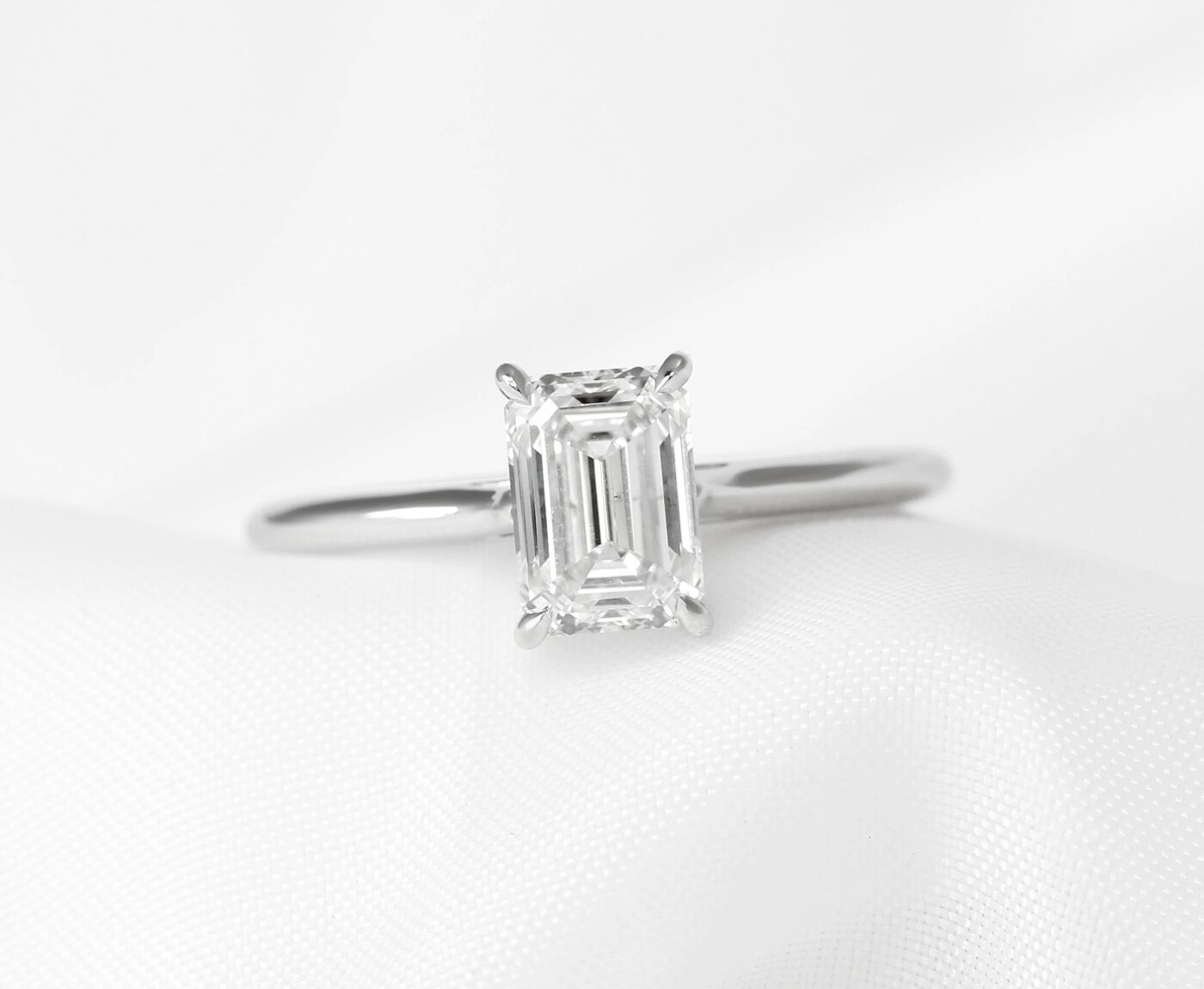 Emerald Cut Diamond Claw Set Solitaire Ring in Platinum