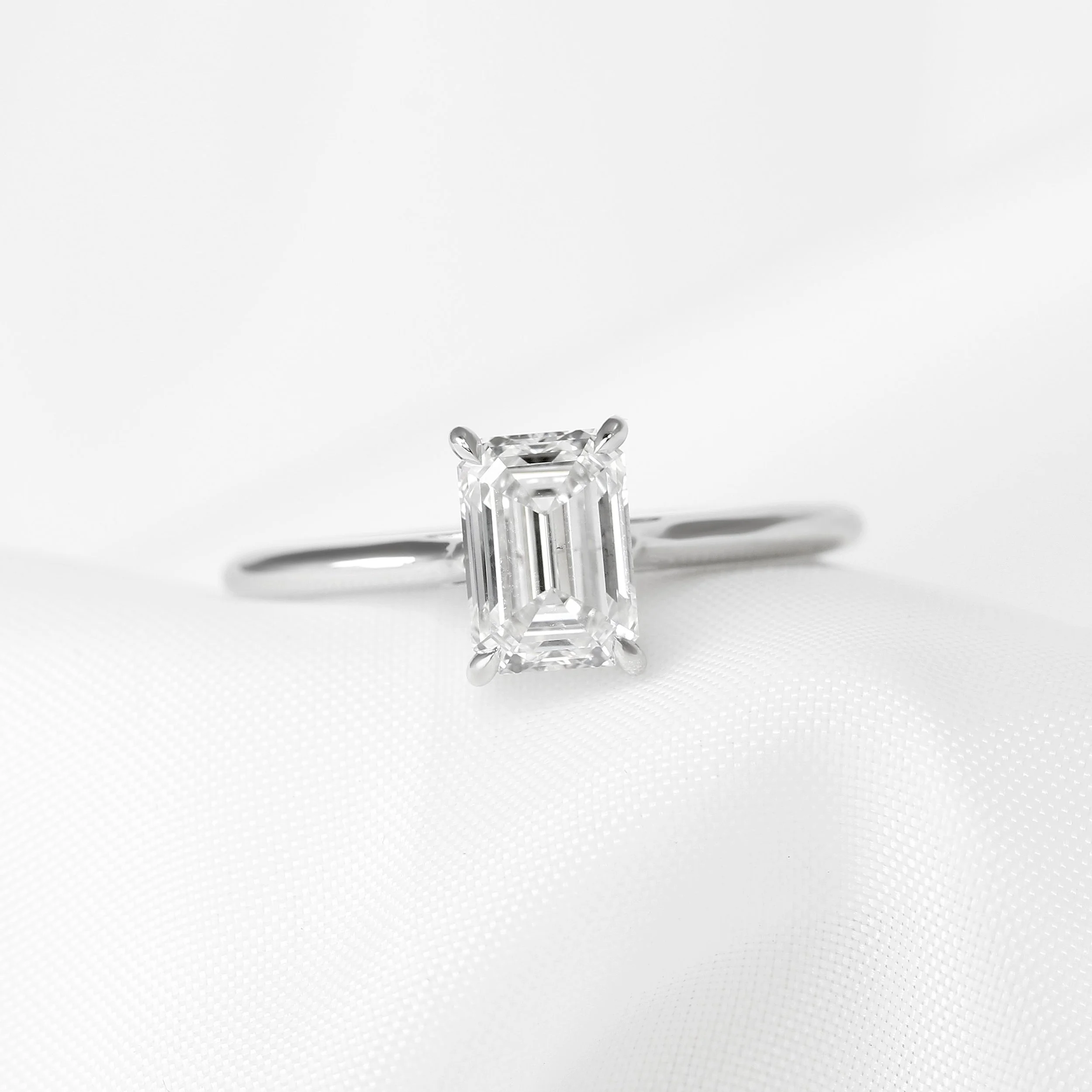 Emerald Cut Diamond Claw Set Solitaire Ring in Platinum