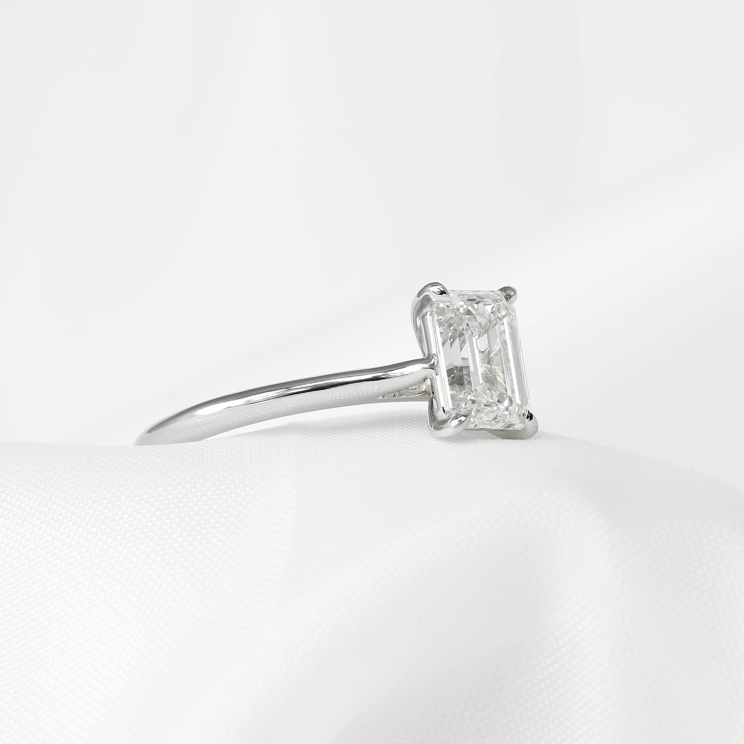 Emerald Cut Diamond Claw Set Solitaire Ring in Platinum