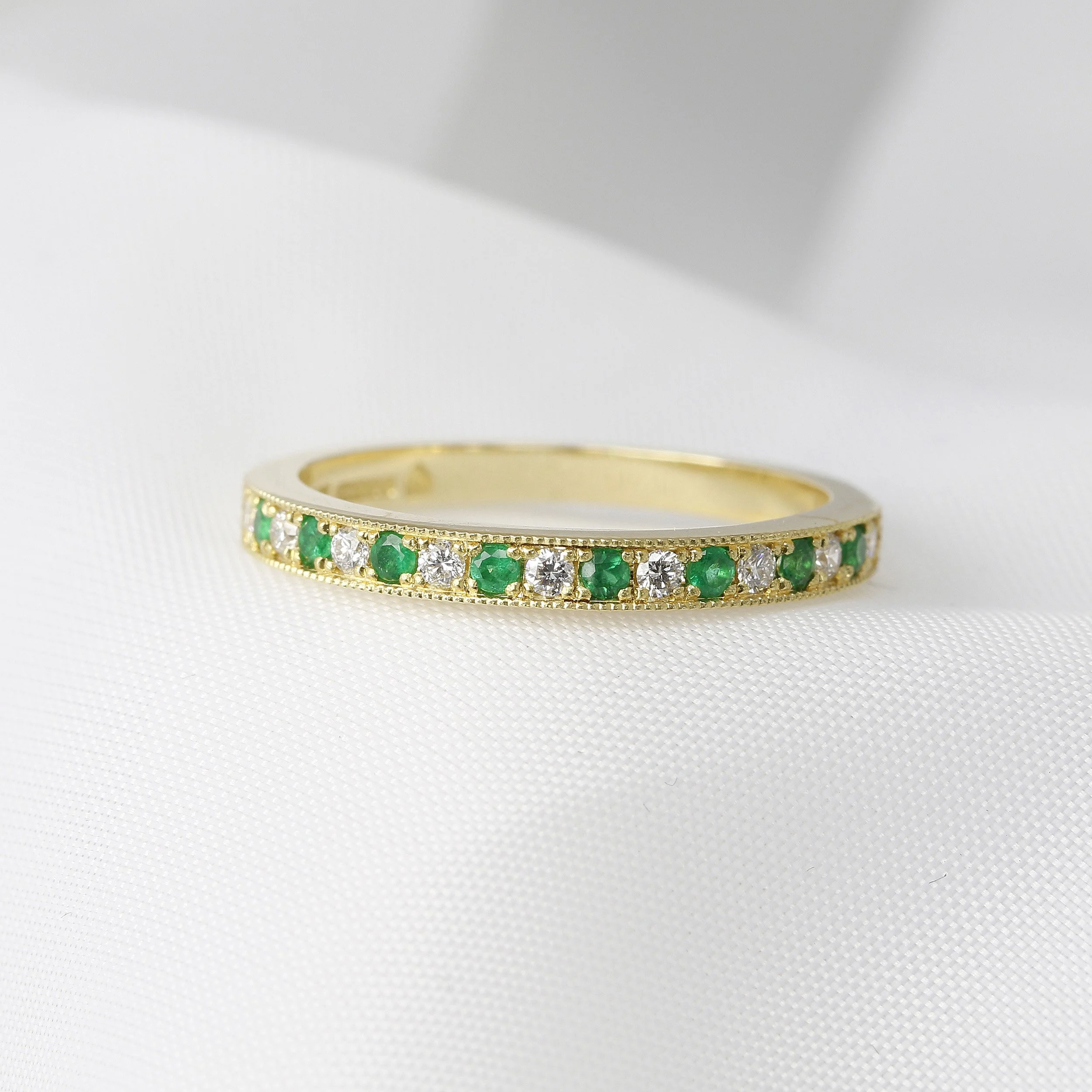 Emerald & Diamond Half Eternity Ring in Yellow Gold