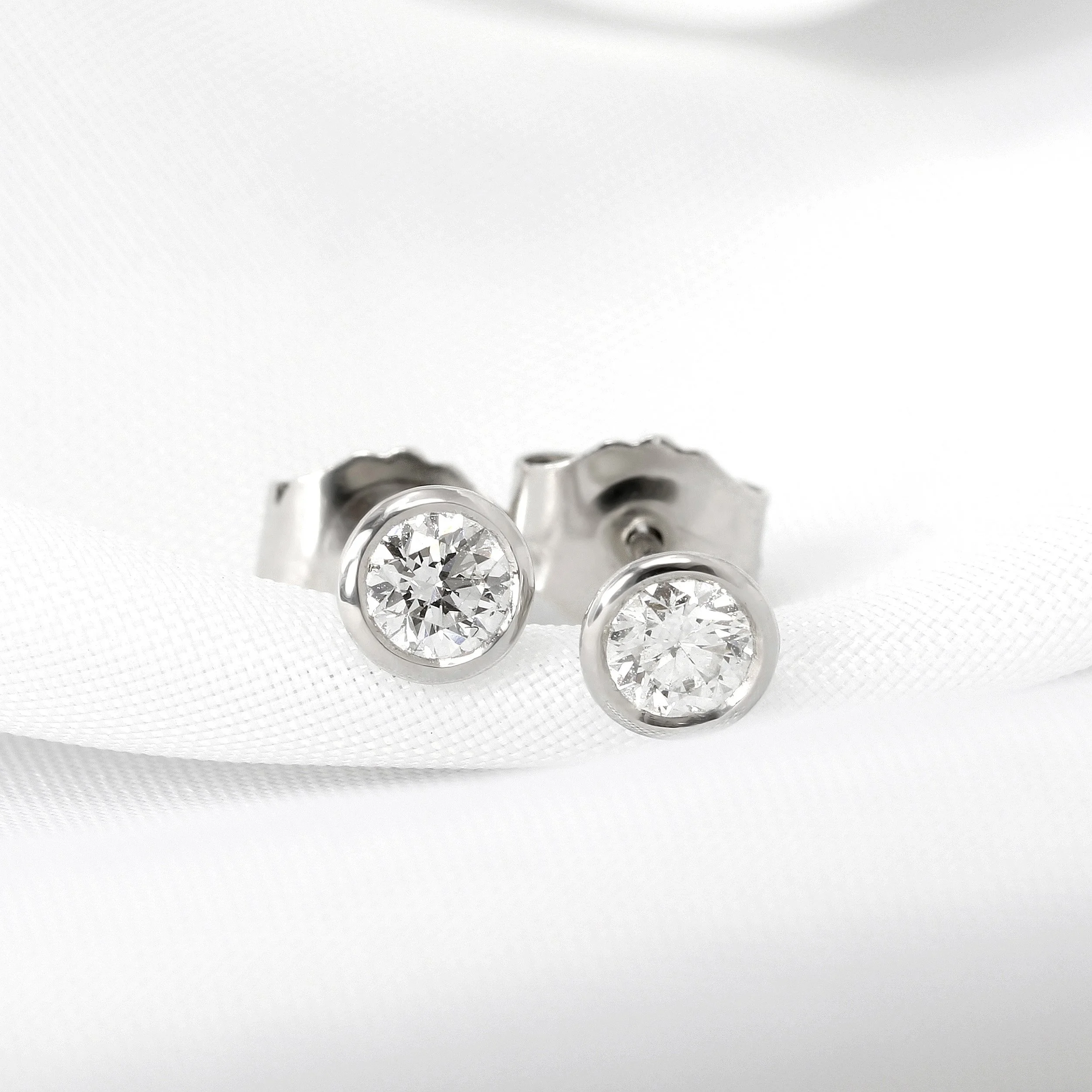 Rub Over Set Round Diamond Earrings