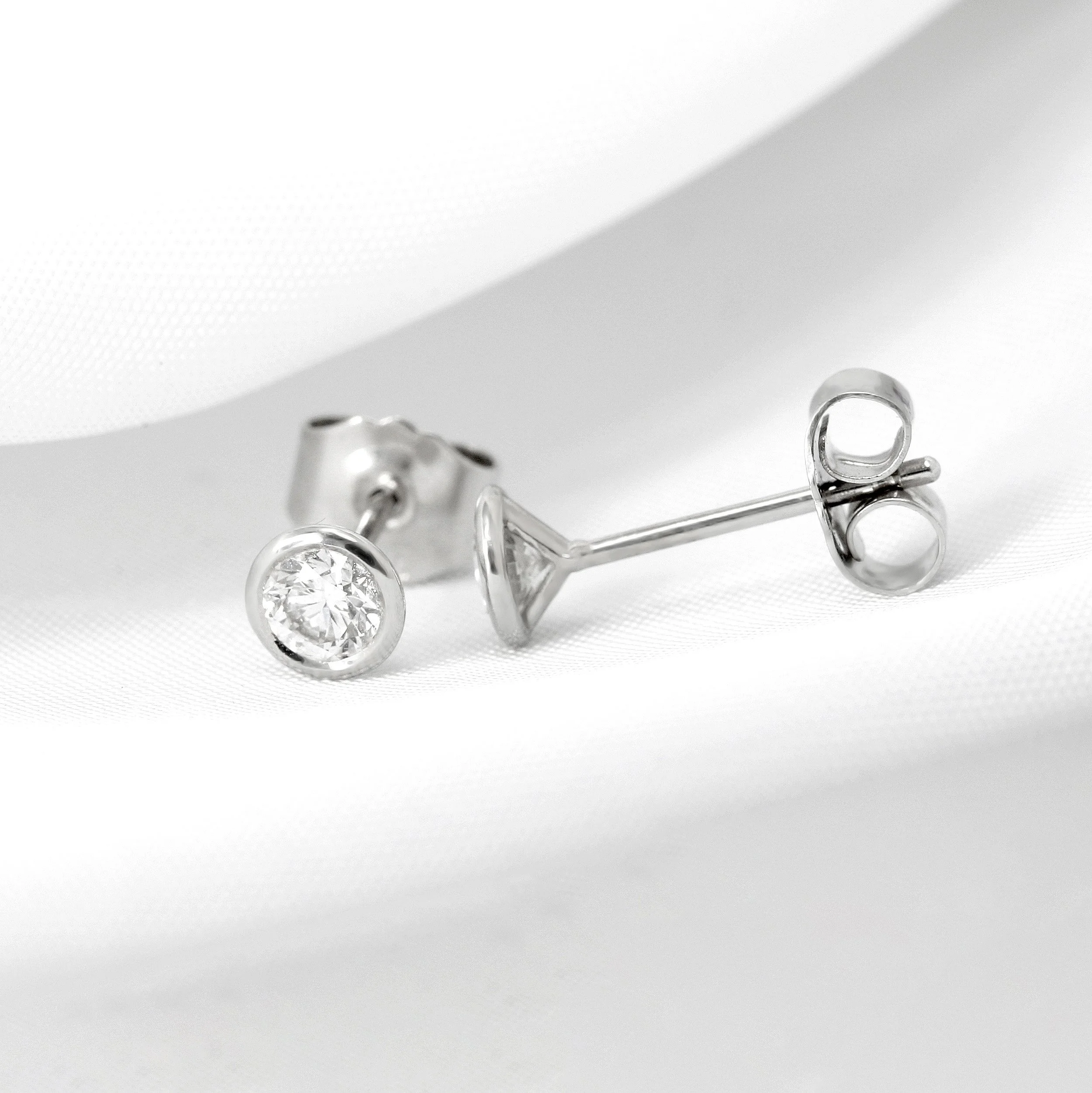 Rub Over Set Round Diamond Earrings