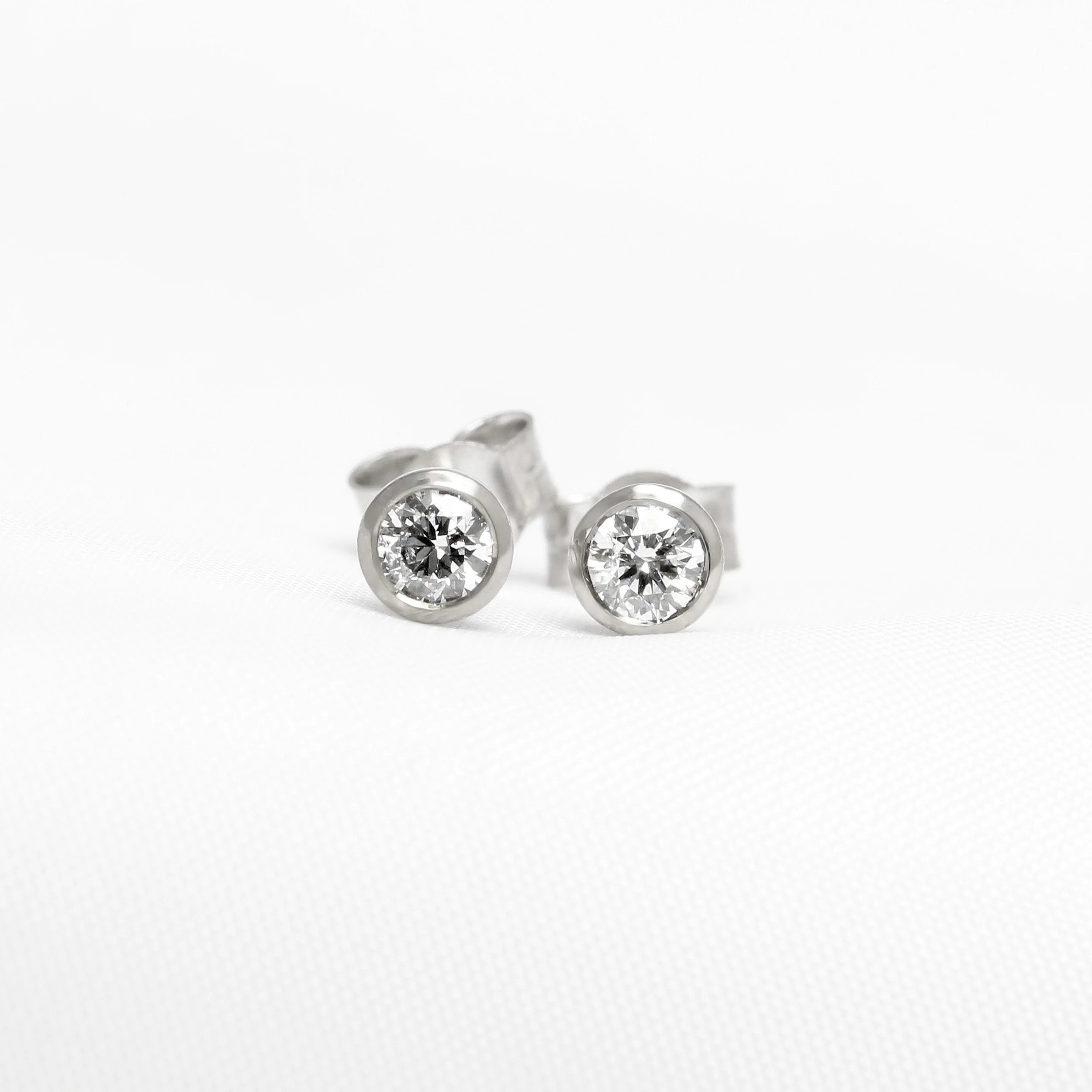 Rub Over Set Diamond Stud Earrings
