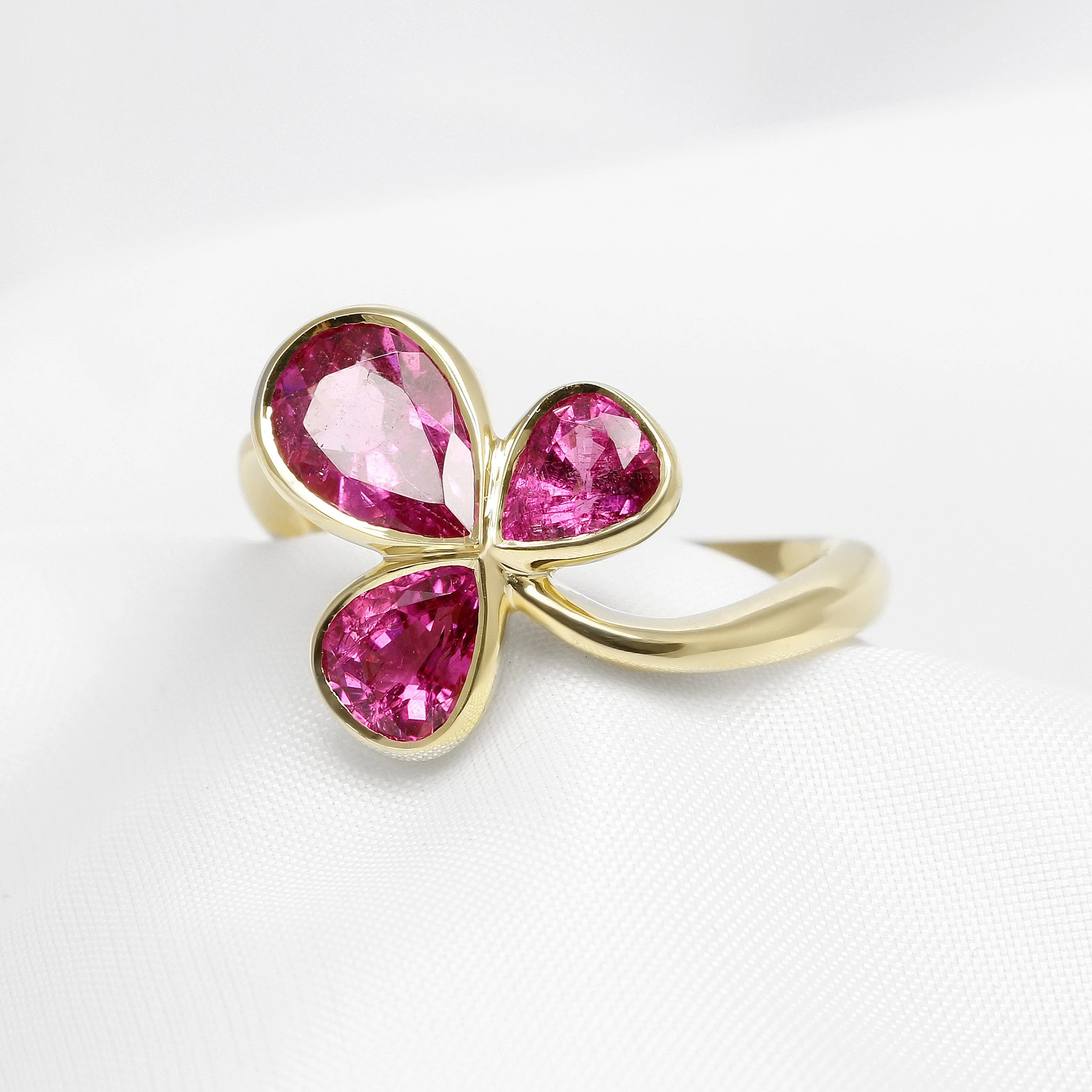 Pink Tourmaline Three Stone Ring in Yellow Gold