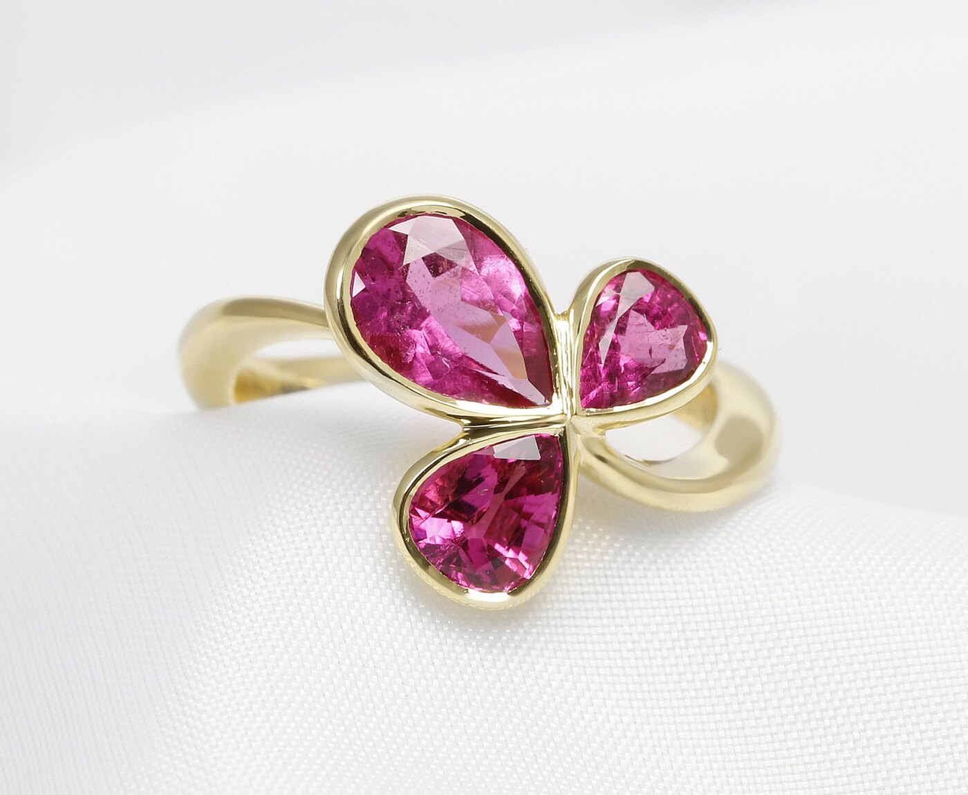 Pink Tourmaline Three Stone Ring in Yellow Gold