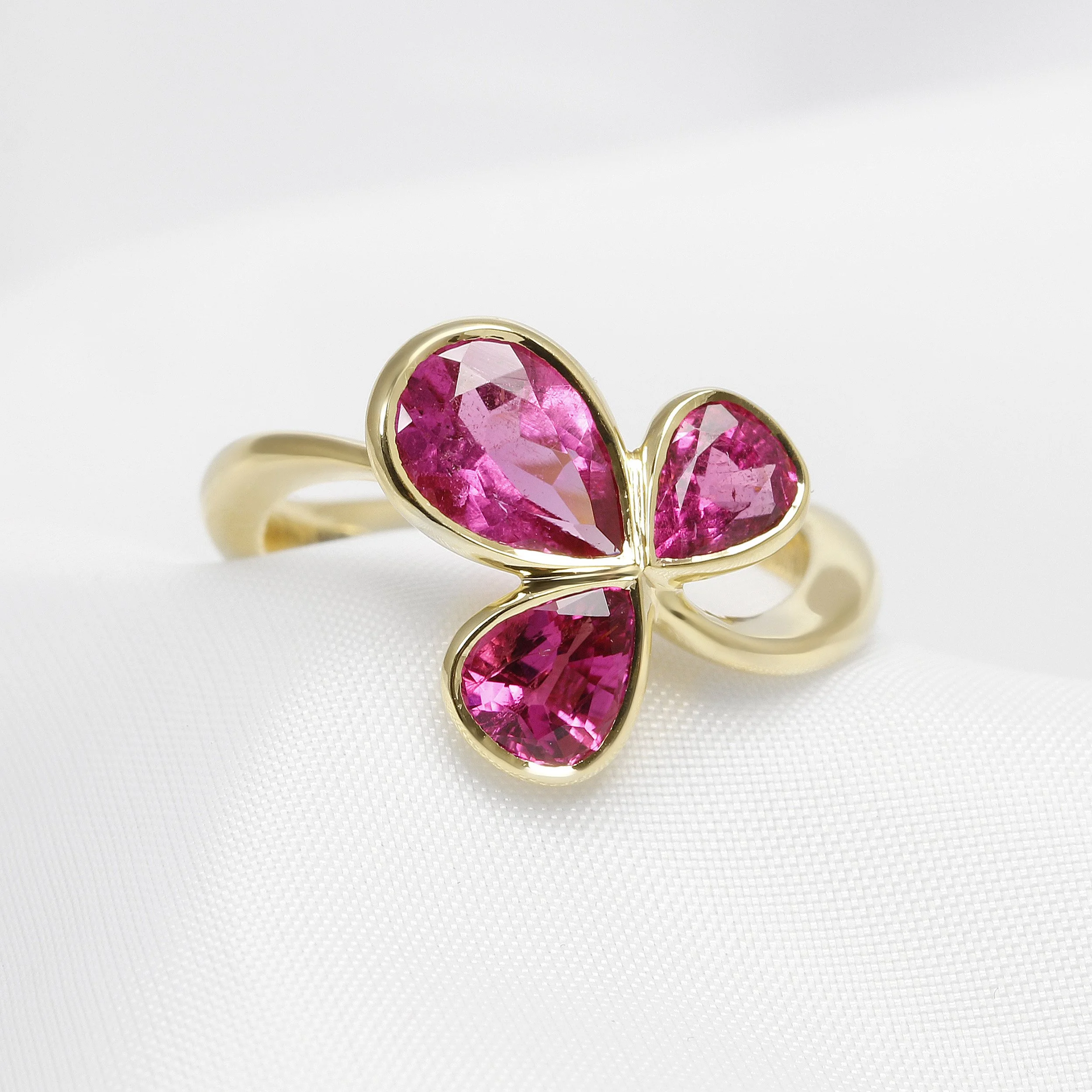 Pink Tourmaline Three Stone Ring in Yellow Gold
