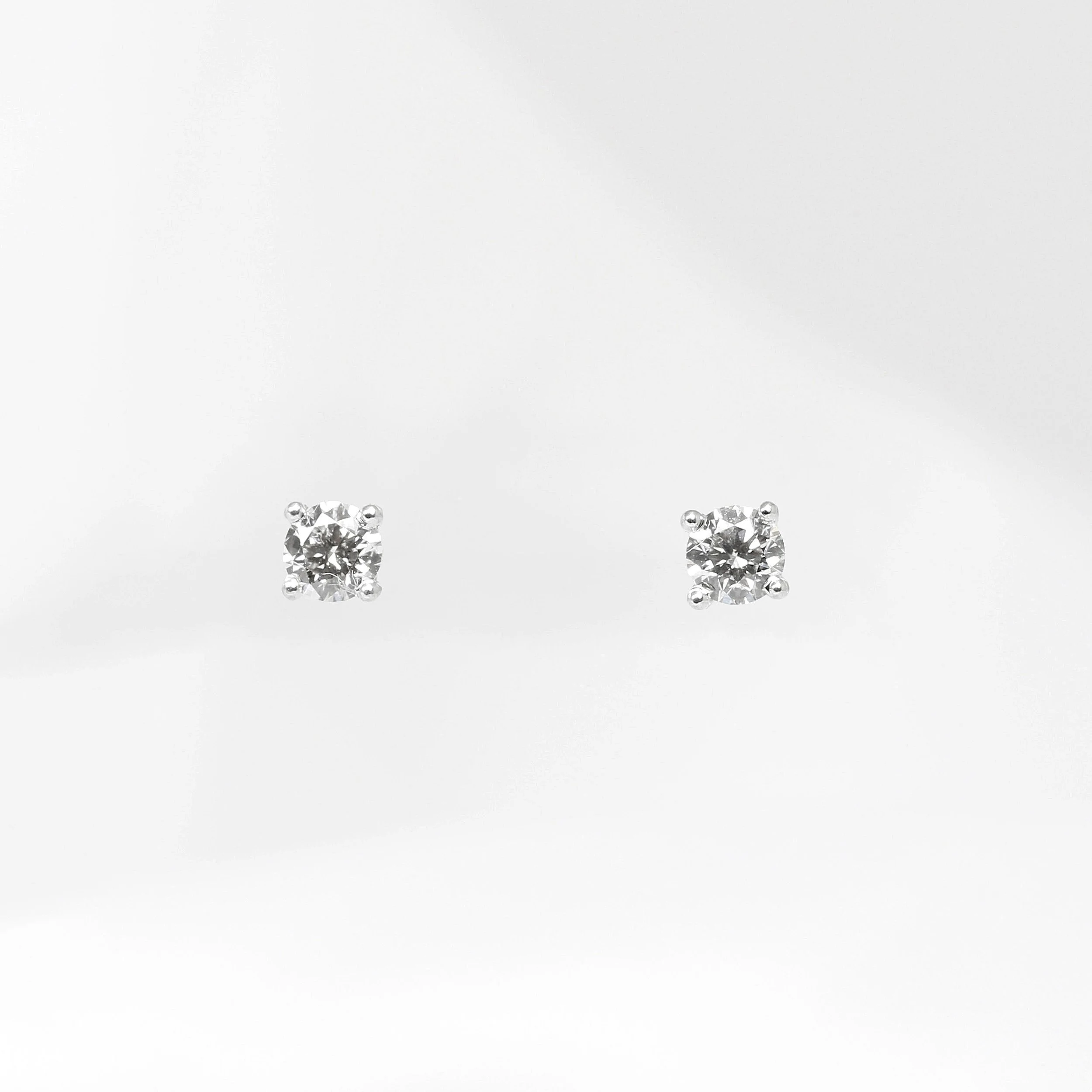 0.25ct Claw Set White Gold Diamond Stud Earrings