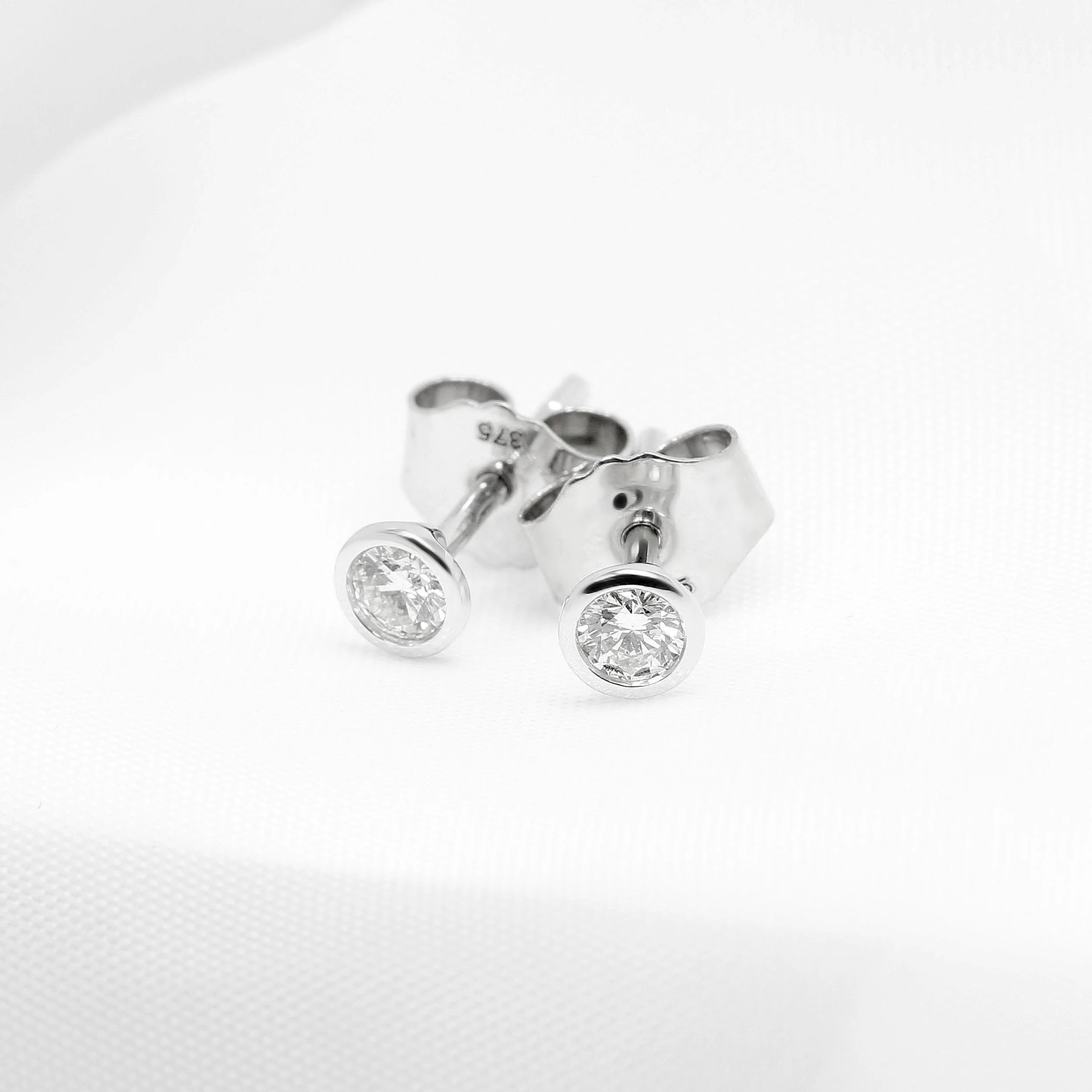 0.20ct Rub Over Diamond Stud Earrings