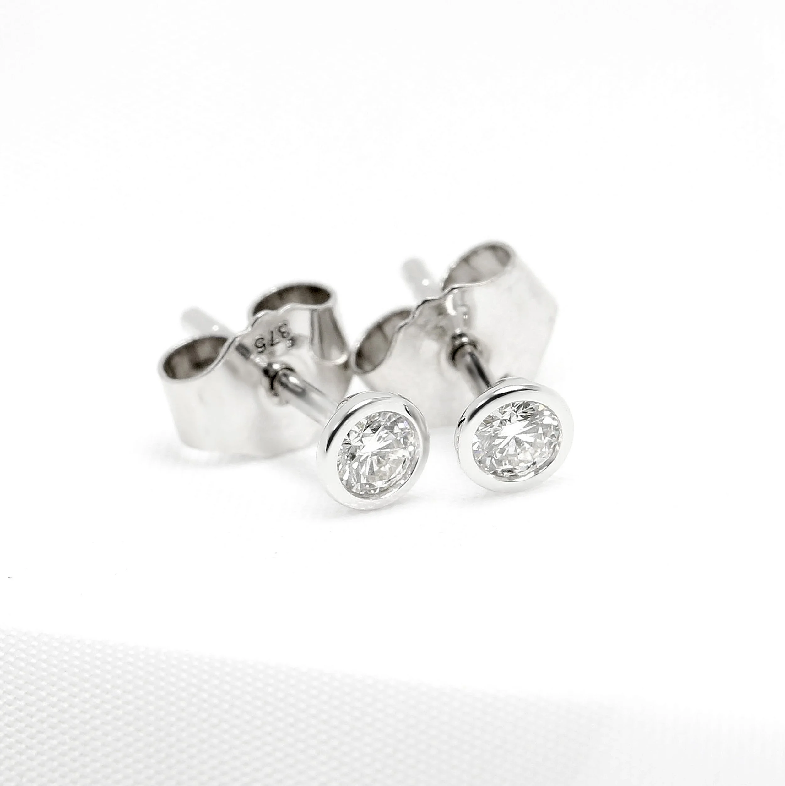 0.20ct Rub Over Diamond Stud Earrings