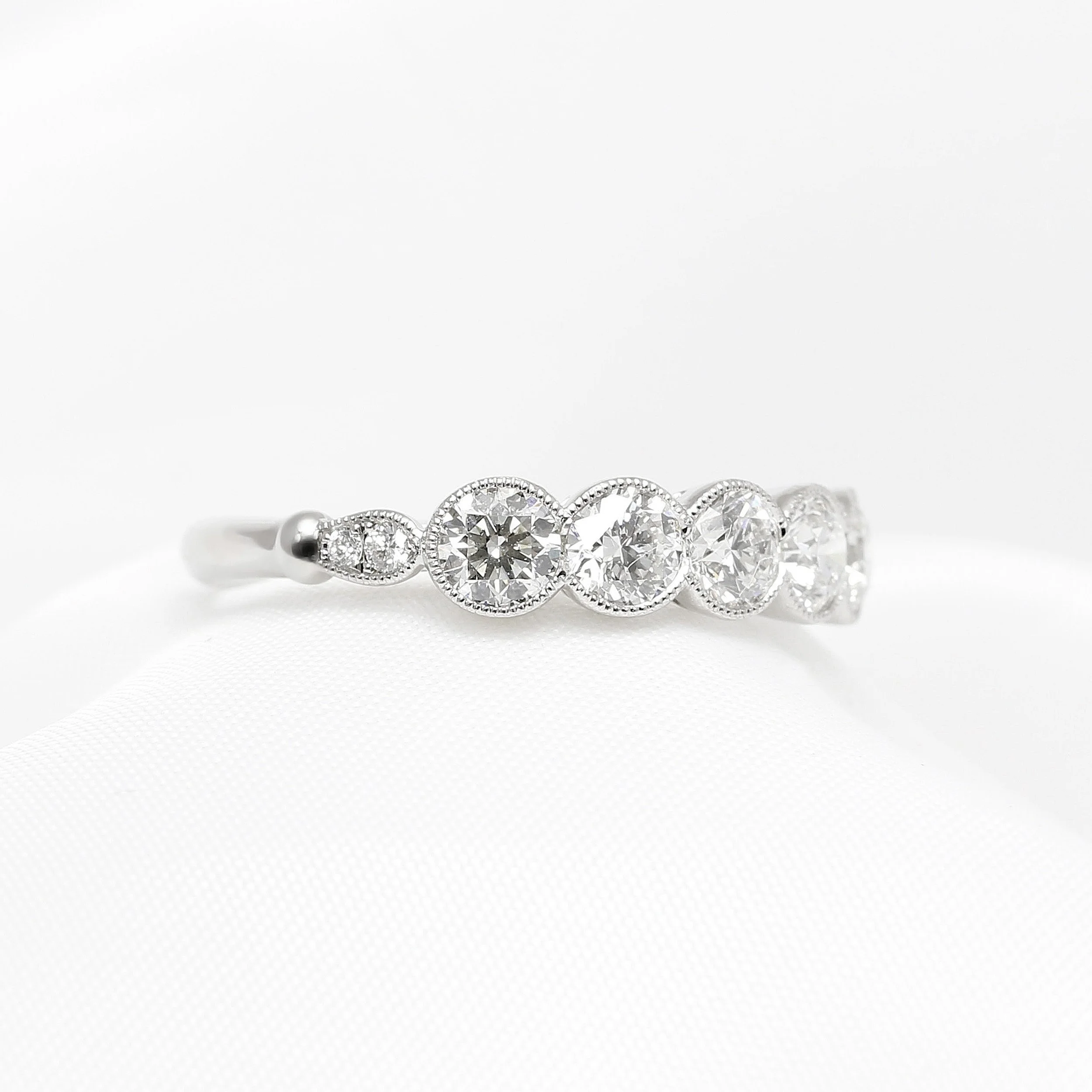 Rub-over Set Five Stone Half Eternity Ring