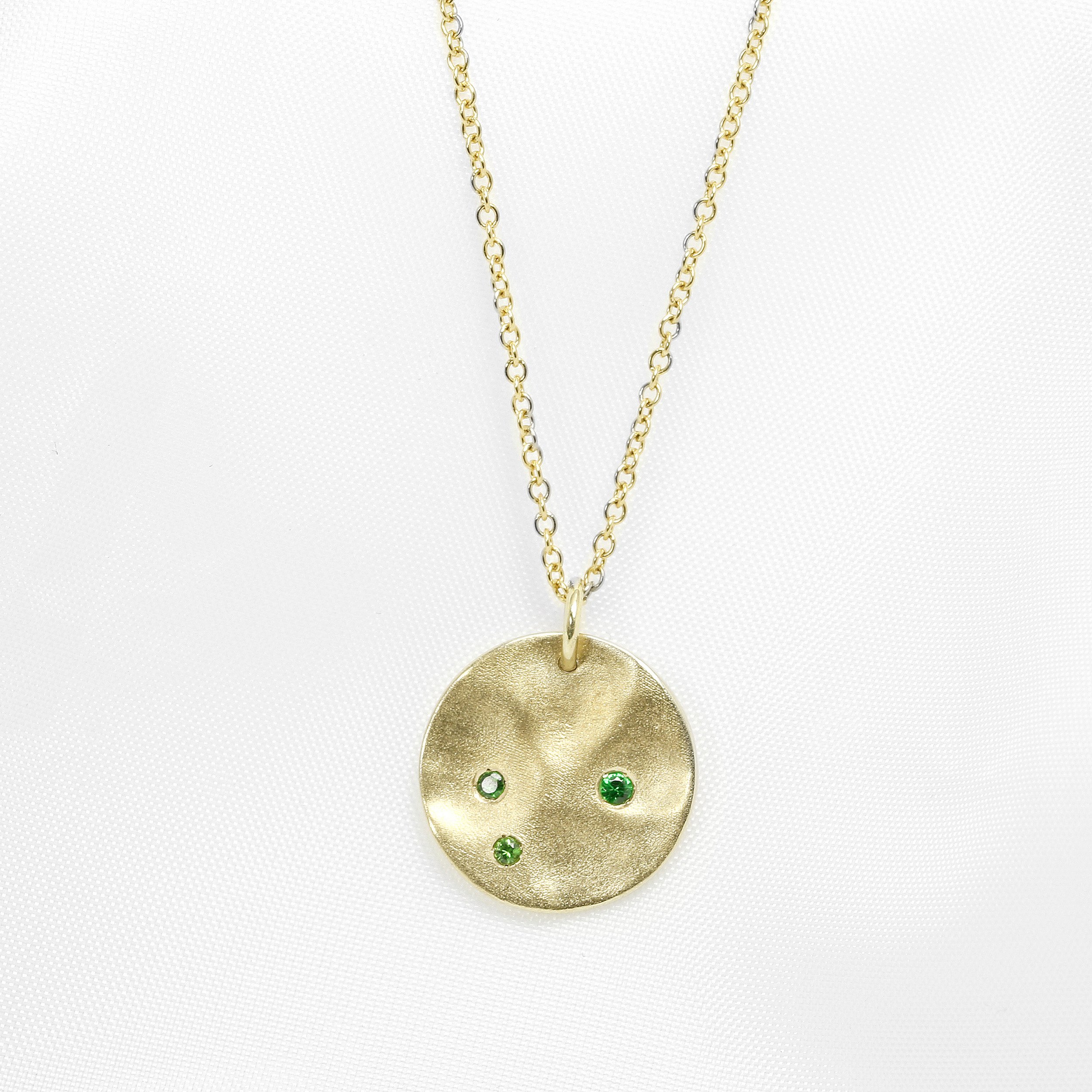 Molten Disc Pendant with Tsavorite Garnets in Yellow Gold