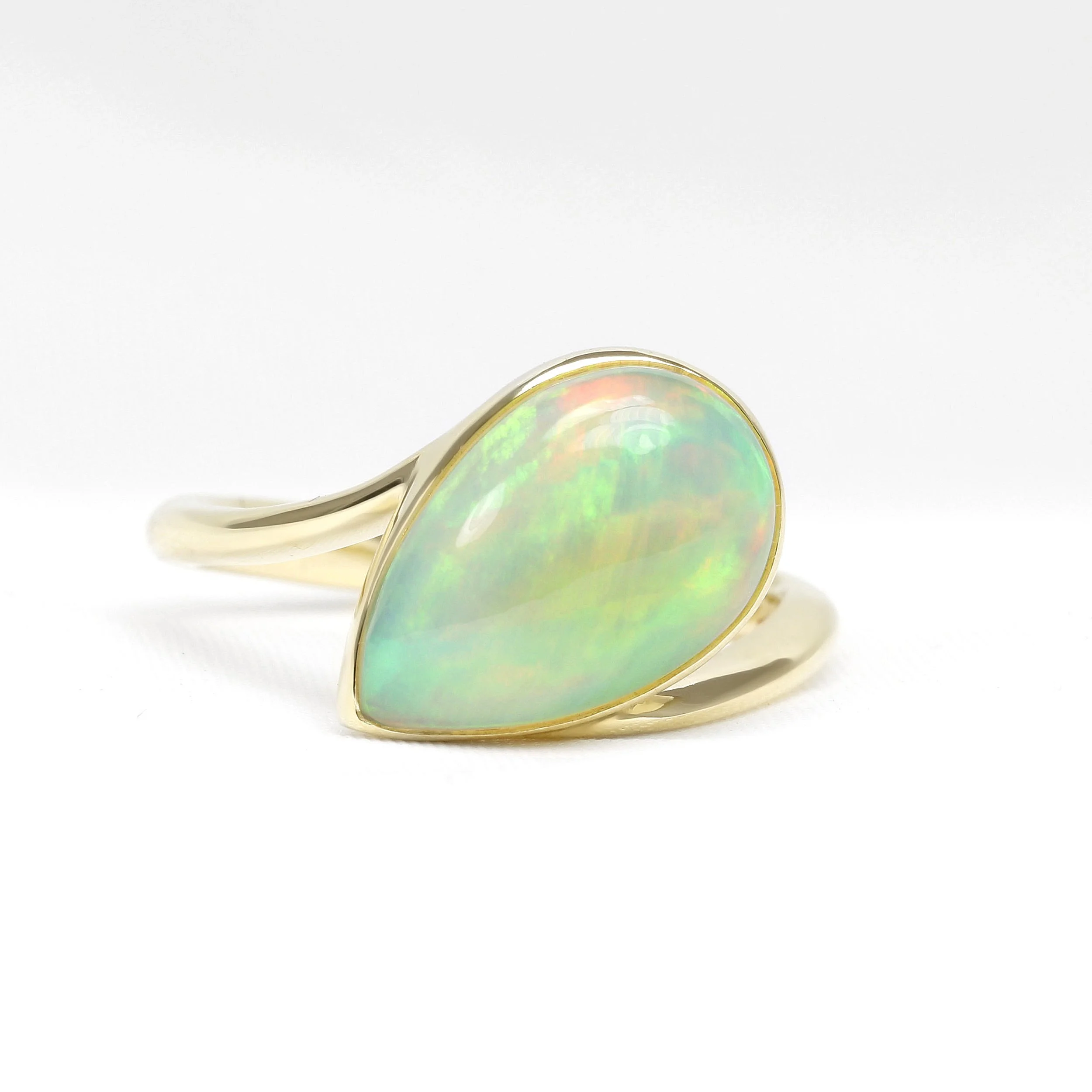 Cabochon Pear Shape Opal Ring in Yellow Gold