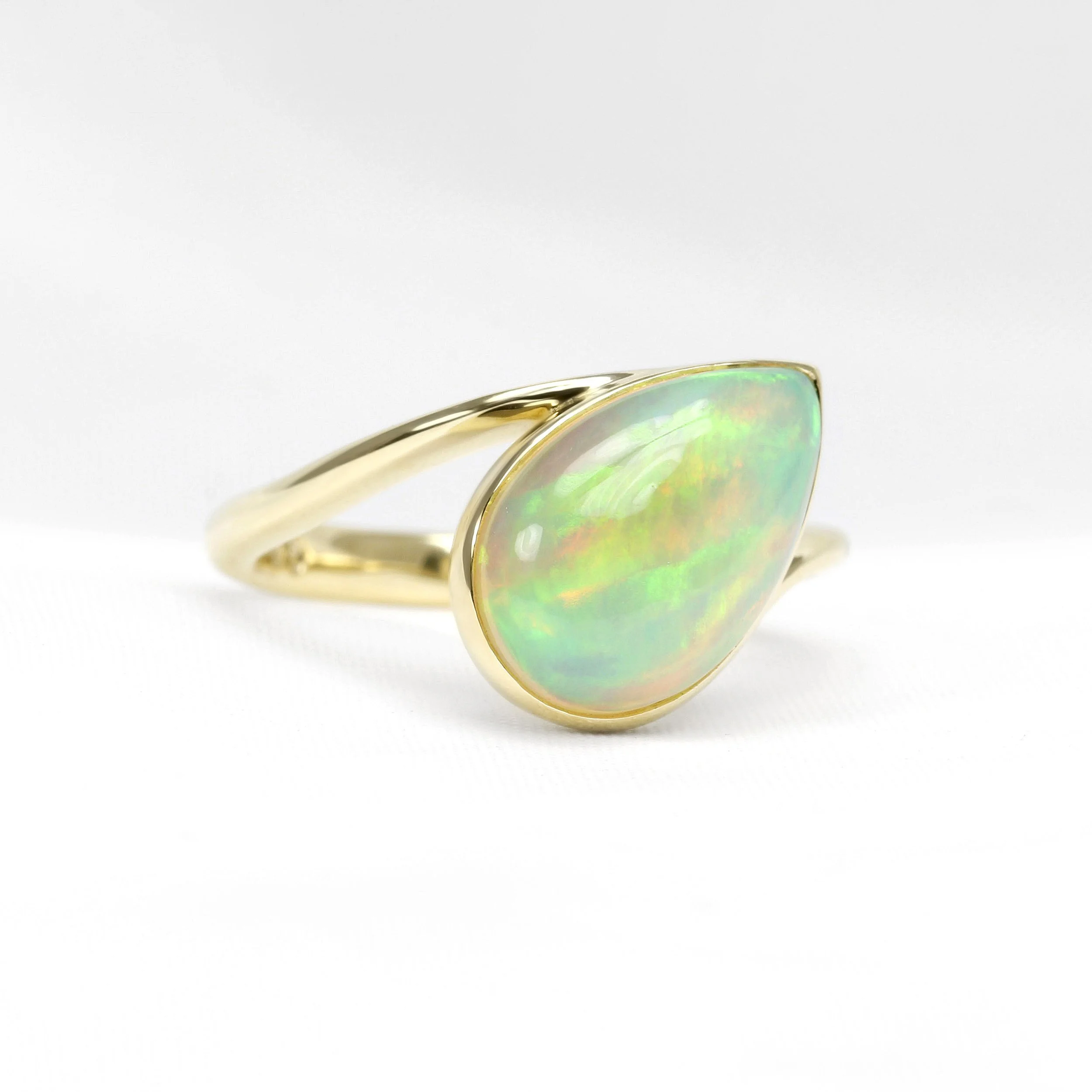 Cabochon Pear Shape Opal Ring in Yellow Gold