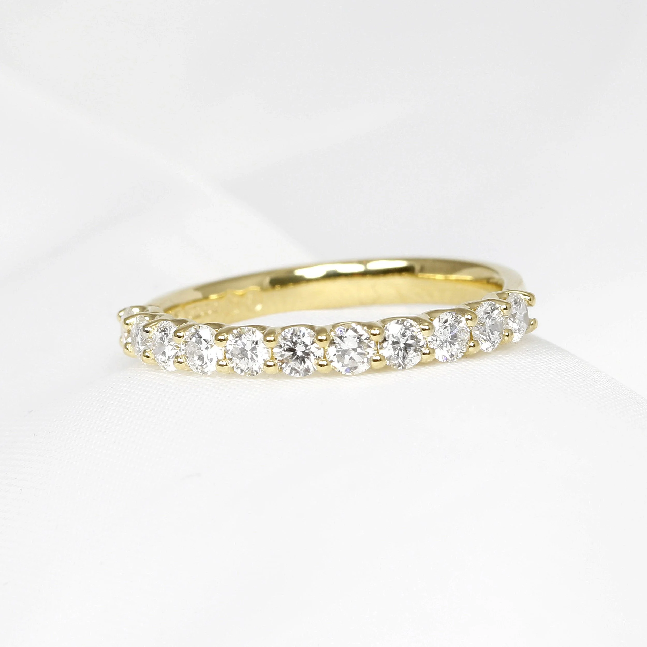 Shared Claw Diamond Half Eternity Ring in Yellow Gold