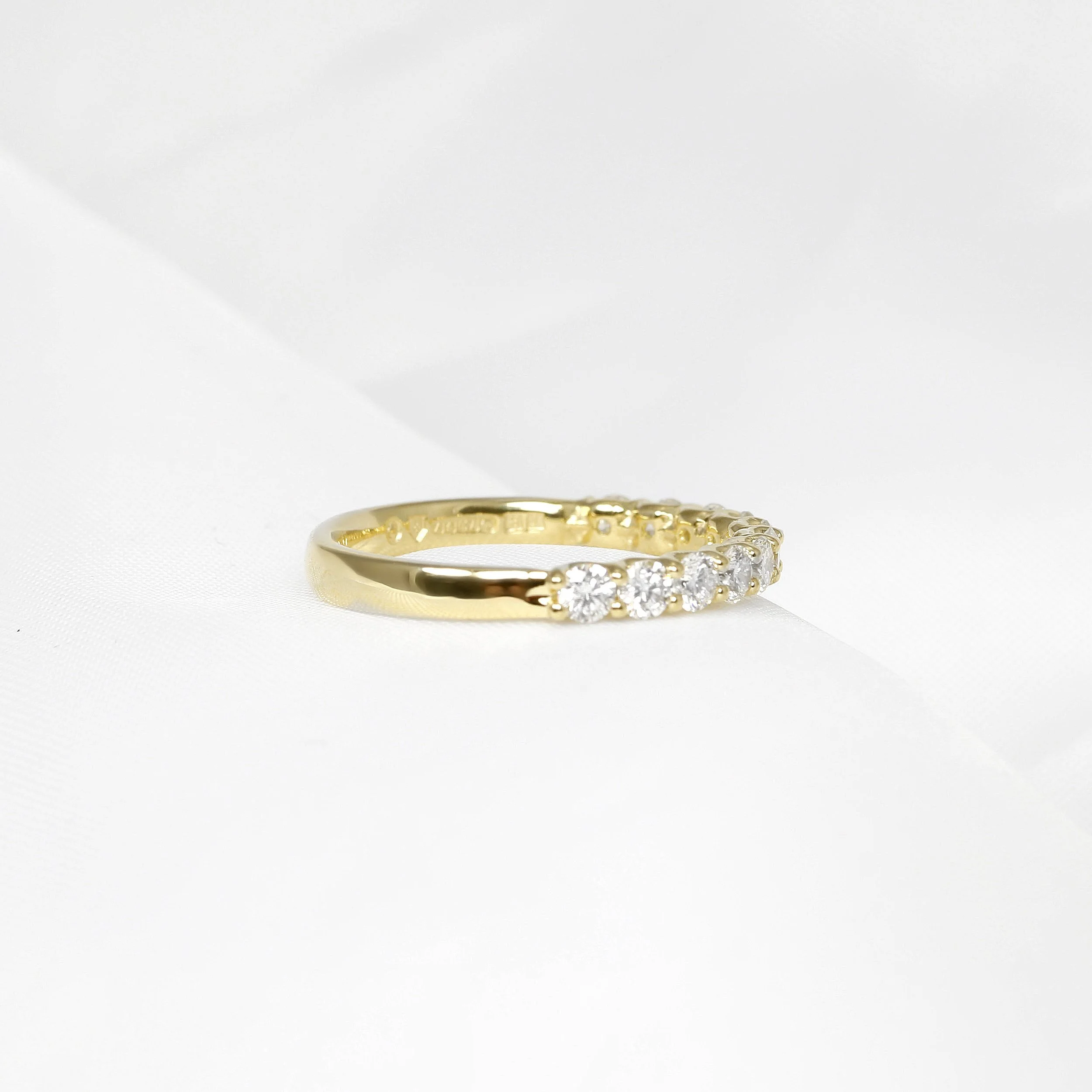 Shared Claw Diamond Half Eternity Ring in Yellow Gold
