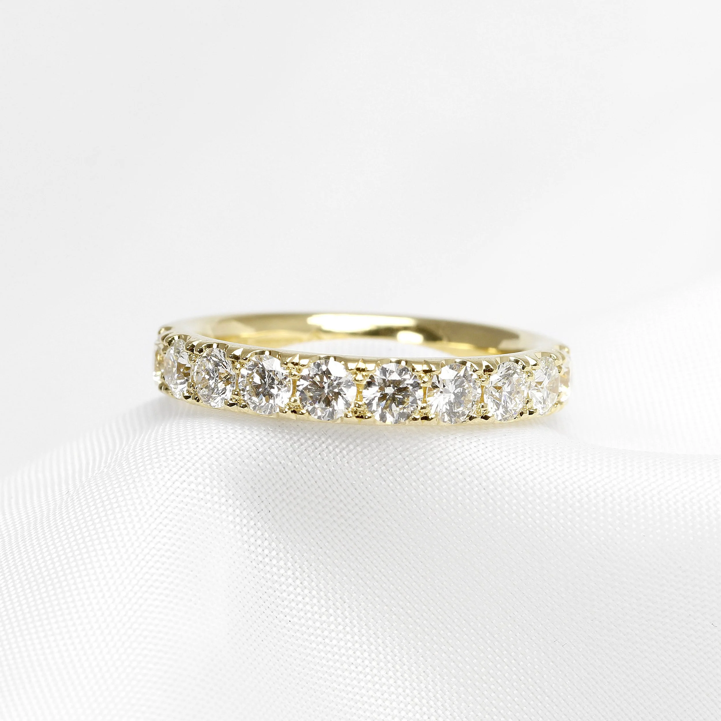Cutaway Claw Set Diamond Eternity Ring in Yellow Gold