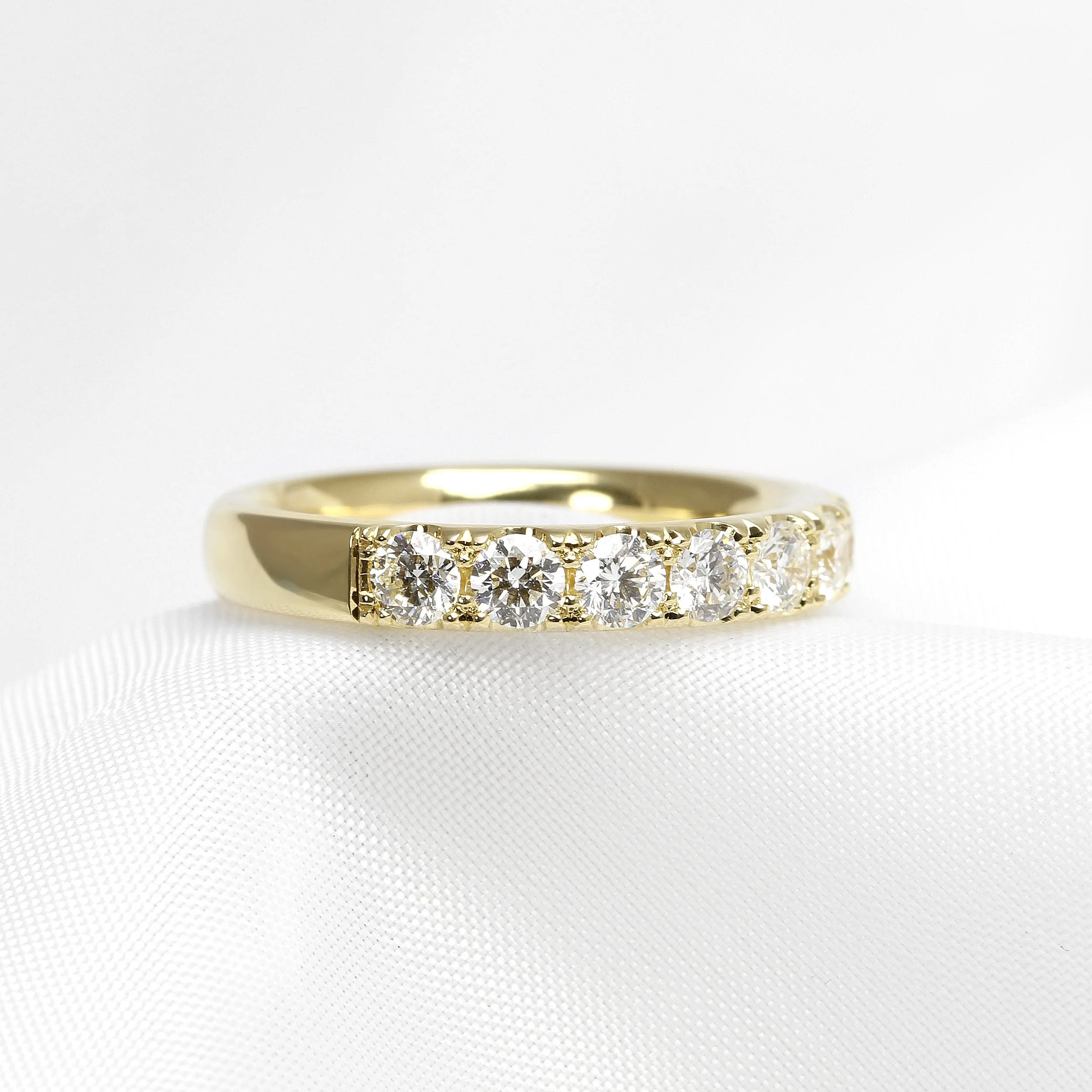 Cutaway Claw Set Diamond Eternity Ring in Yellow Gold