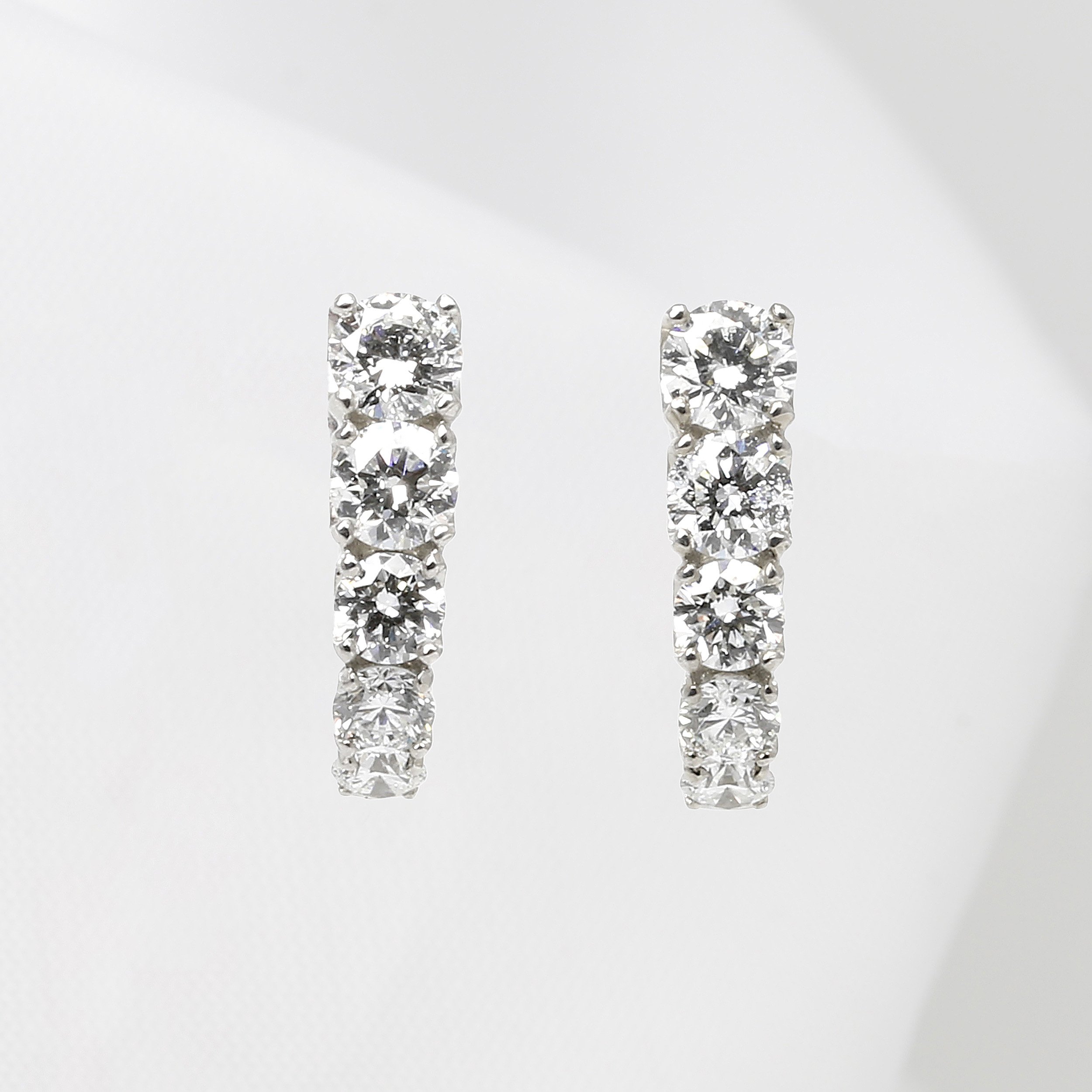 White Gold Graduating Diamond Hoop Earrings