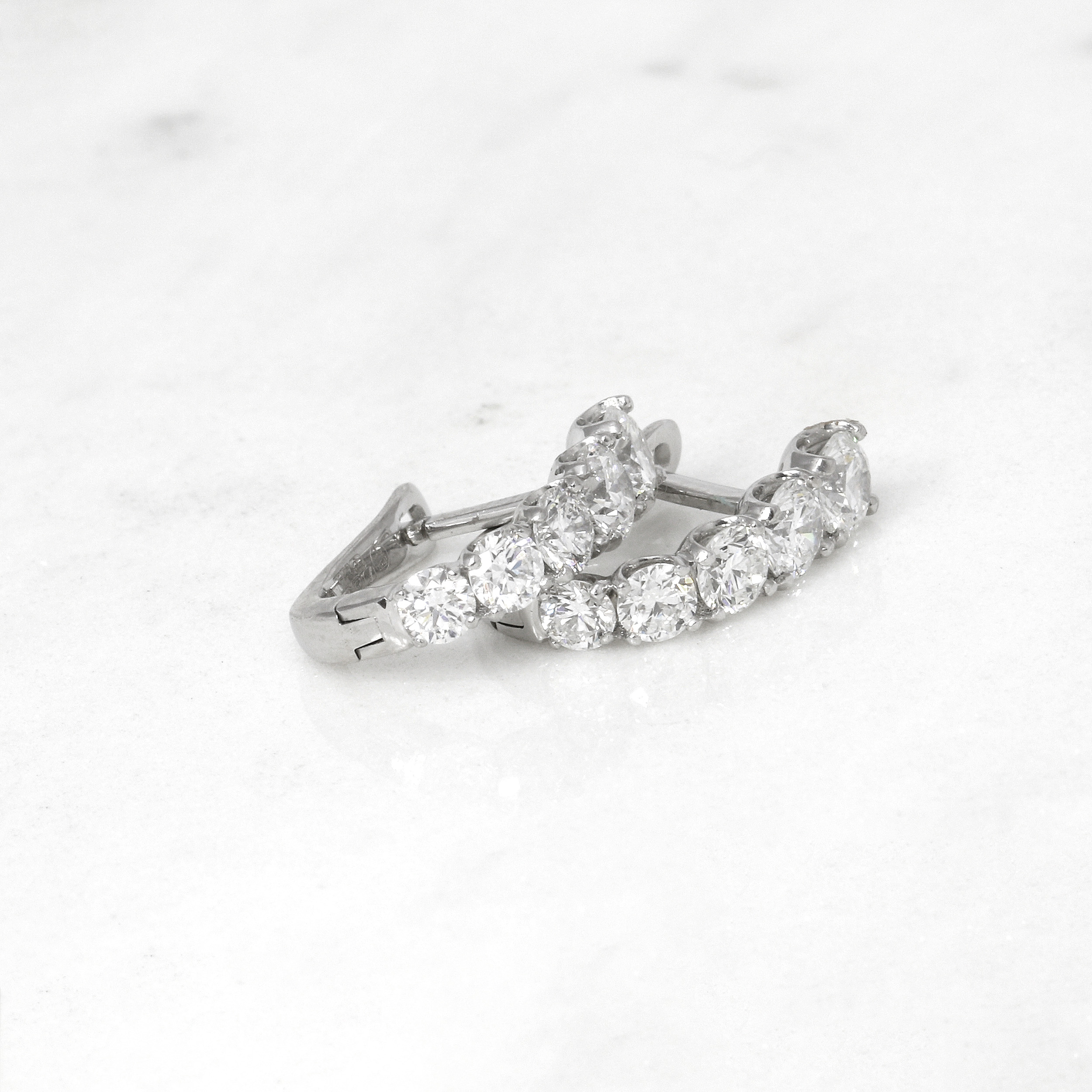 White Gold Graduating Diamond Hoop Earrings