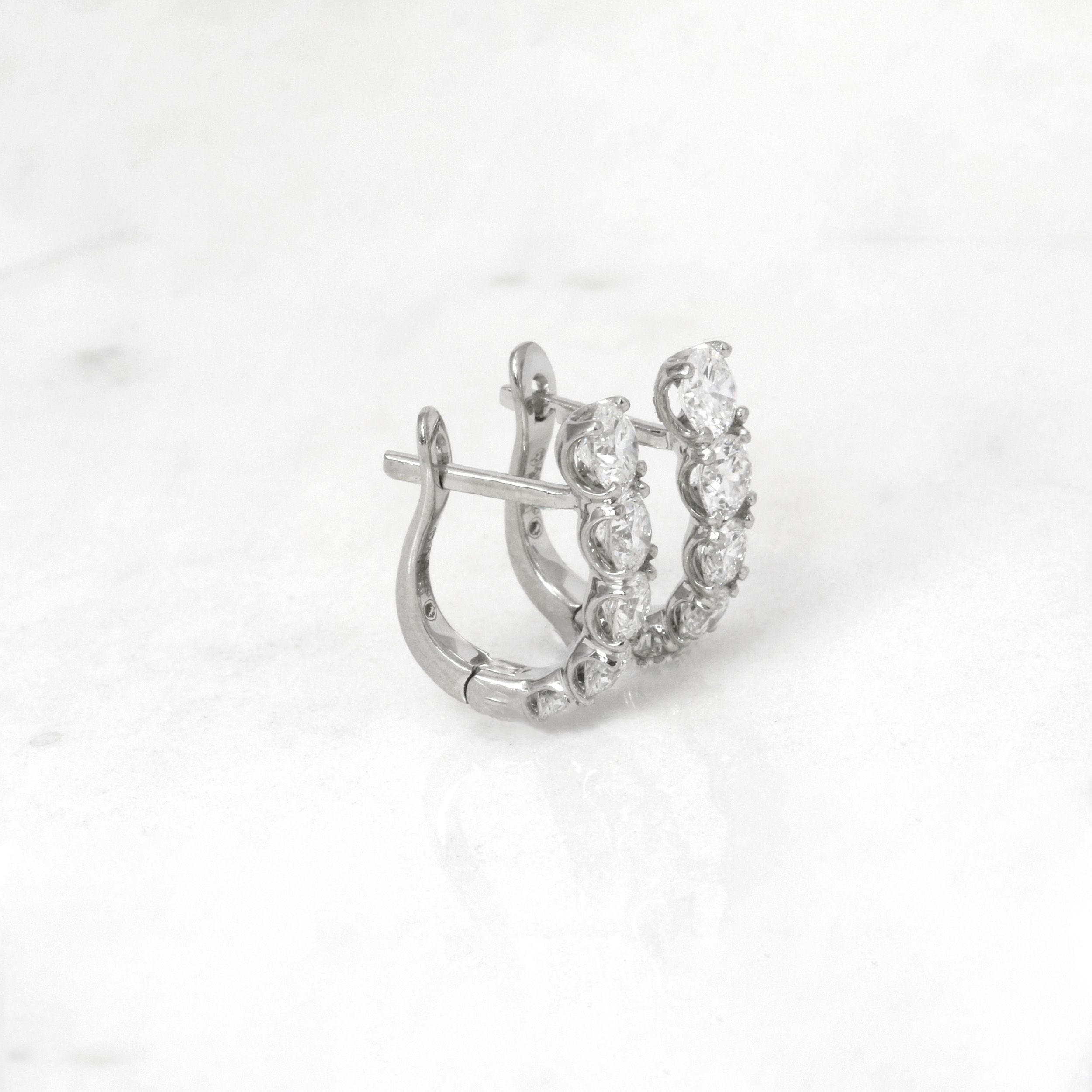 White Gold Graduating Diamond Hoop Earrings