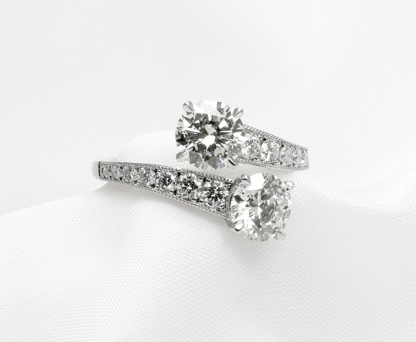 Two Diamond Cross Over Ring in Platinum 