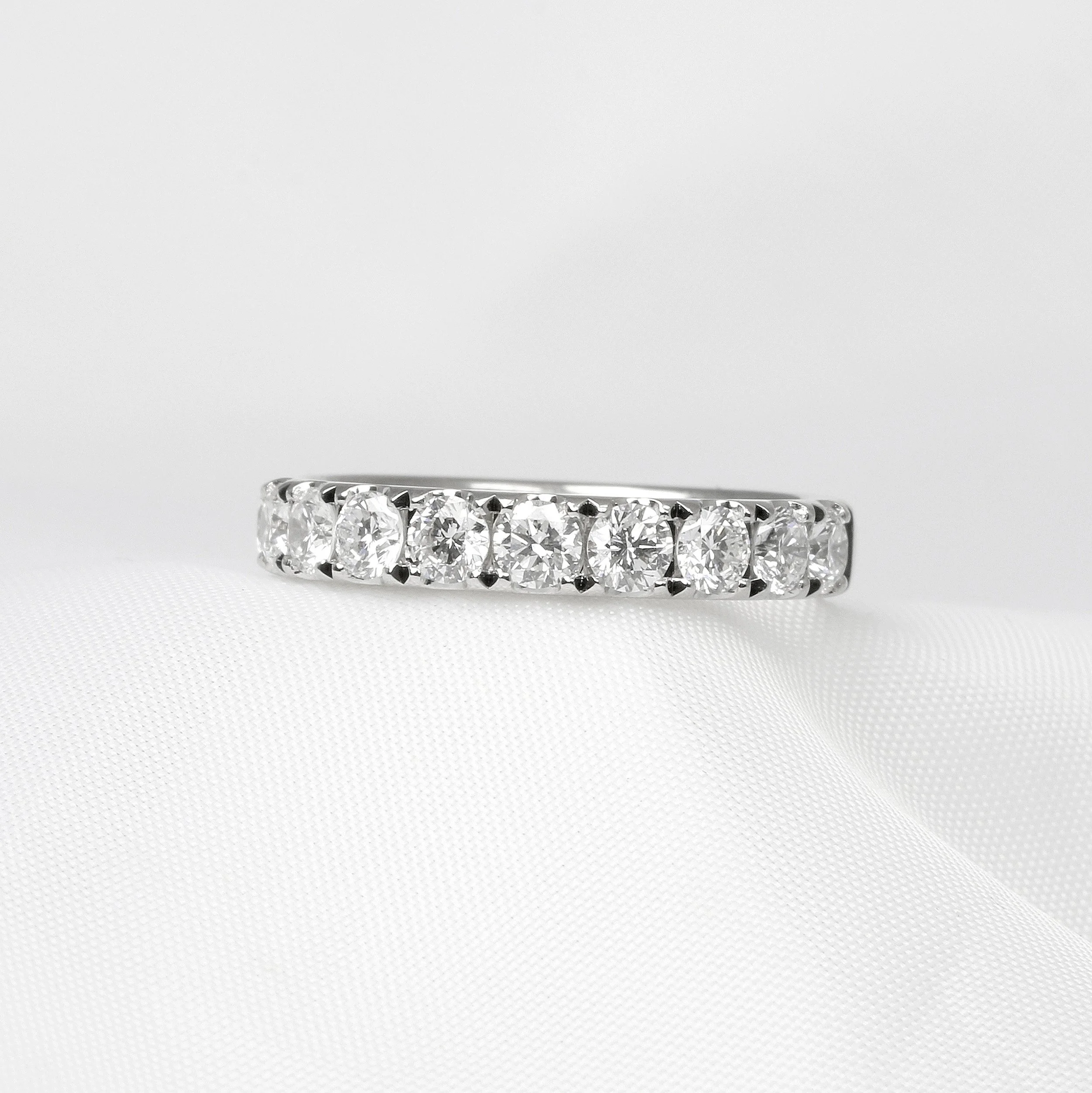 Cutaway Claw Set Diamond Half Eternity Ring