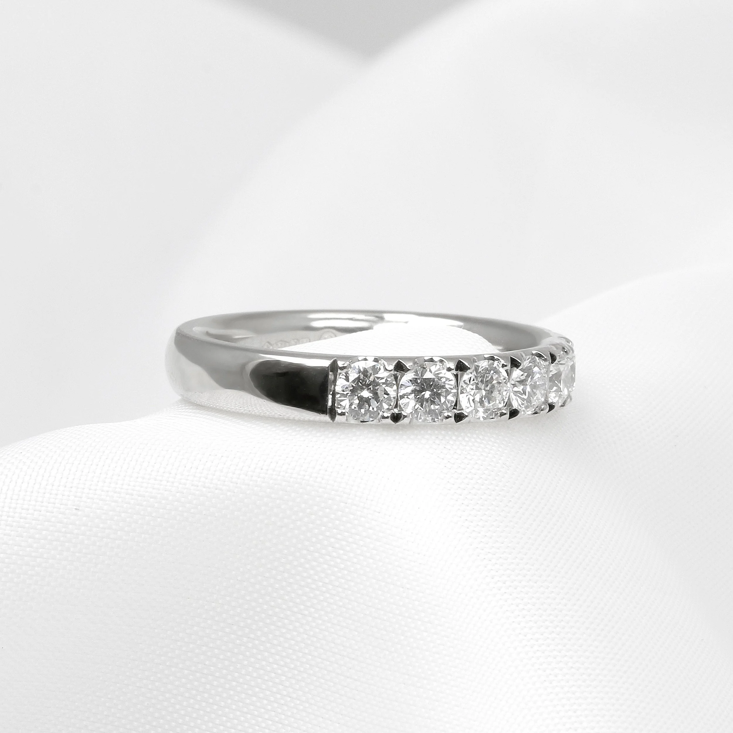 Cutaway Claw Set Diamond Half Eternity Ring