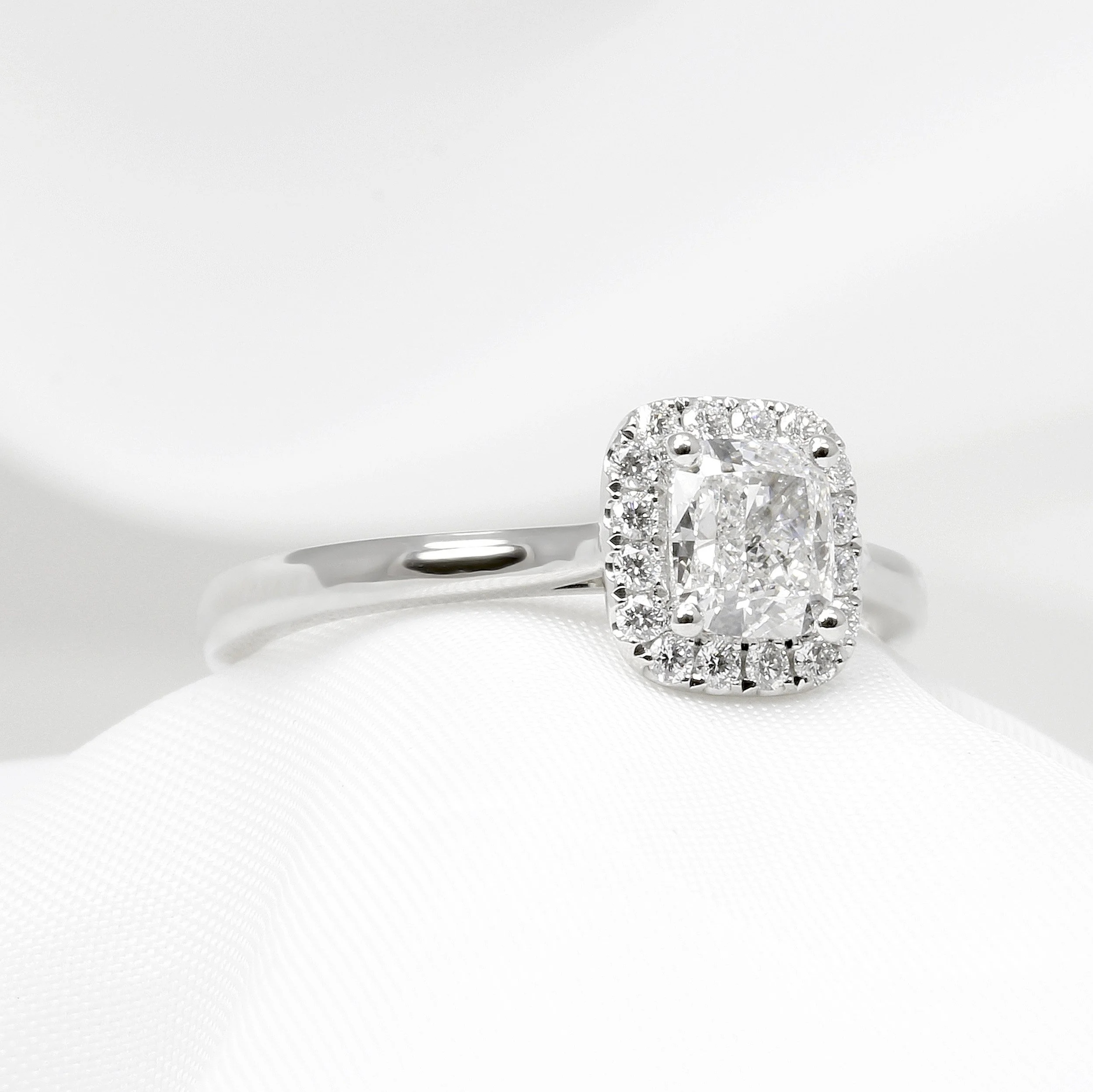 Cushion Cut Diamond Halo Ring in Platinum