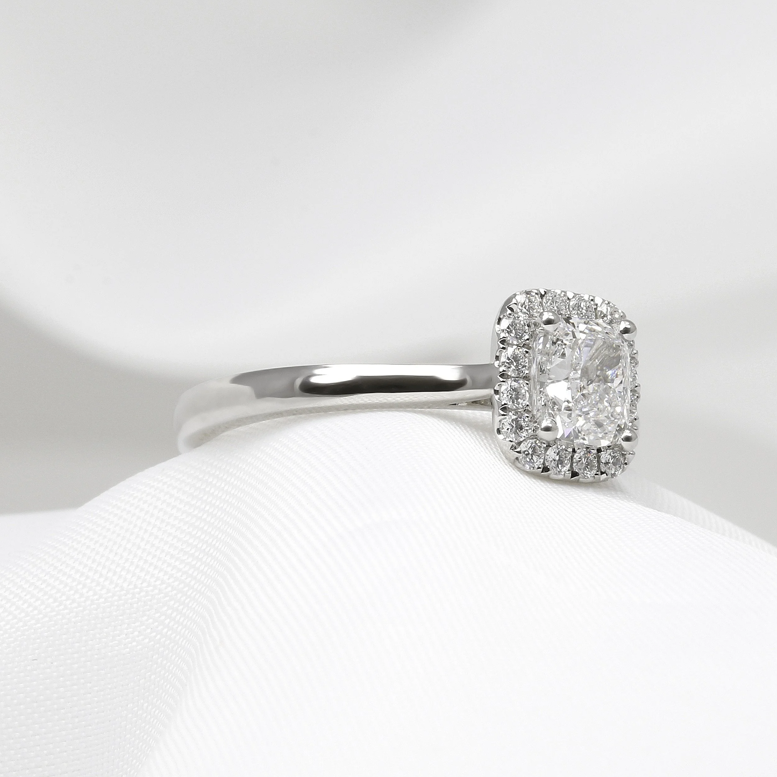 Cushion Cut Diamond Halo Ring in Platinum